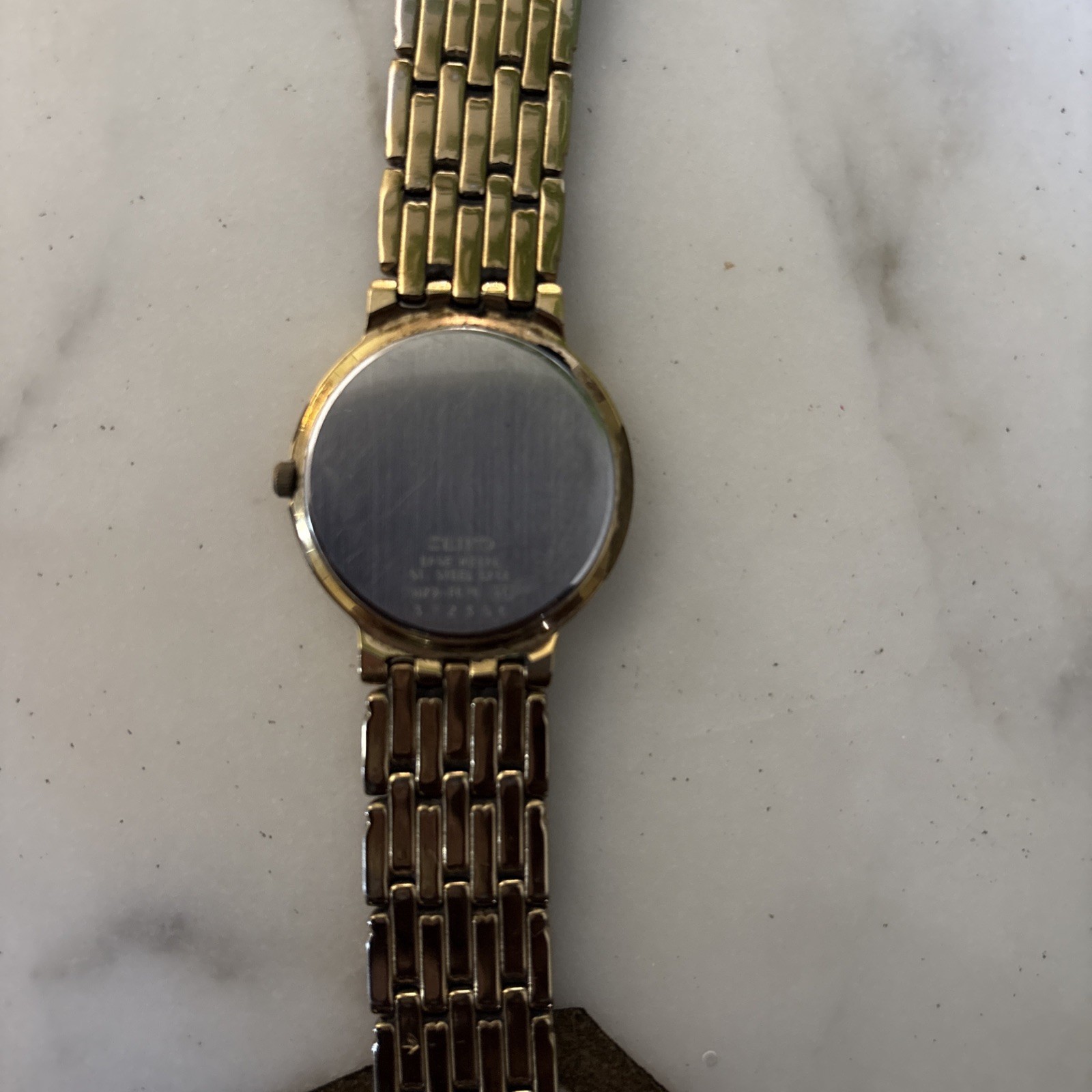 Vintage Men’s Seiko 7N29 F070 Yellow gold tone white dial watch 33mm