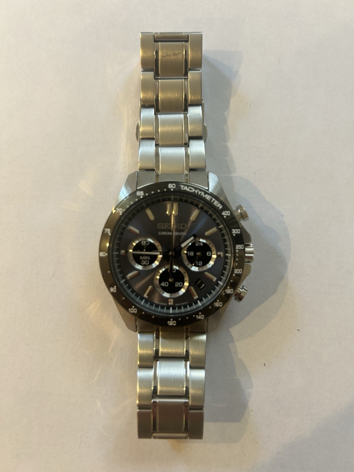 Seiko Quartz Chronograph Tachymeter Date Gray Sunburst Dial SS Bracelet 100m