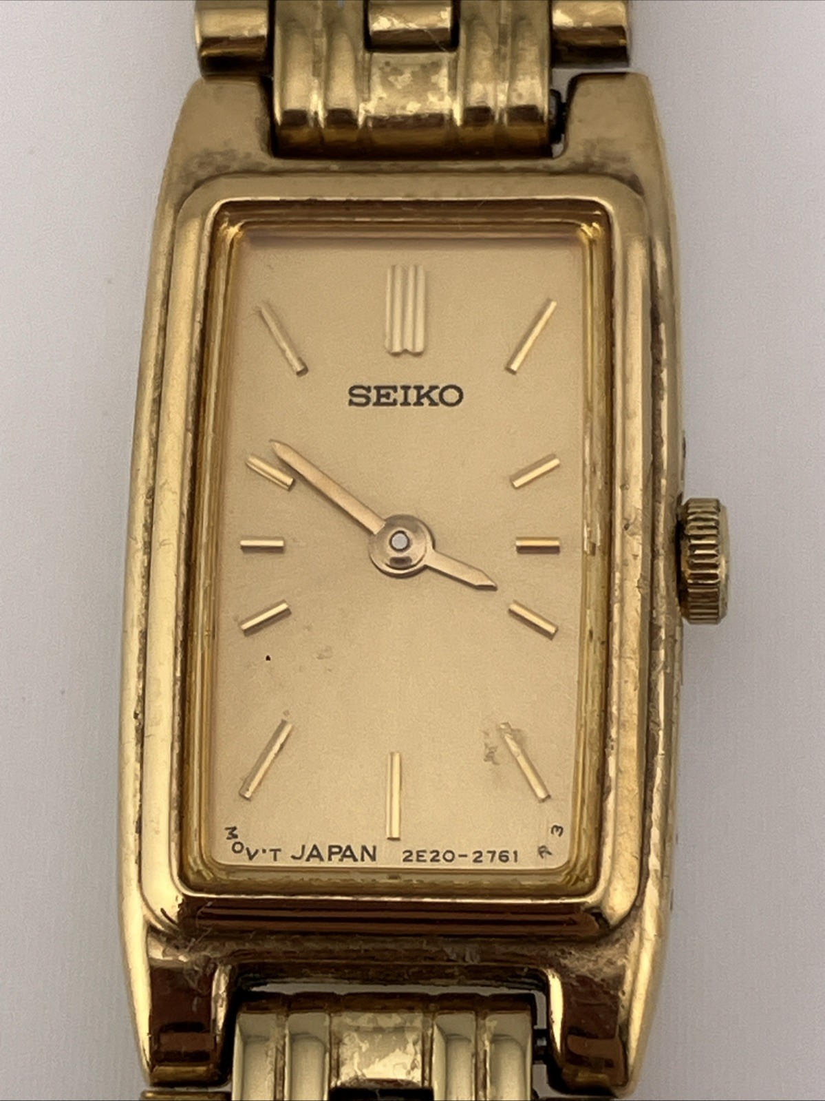 Vtg Seiko Ladies 13mm Watch Gold Tone Gold Tank Dial 5.75″ 2e20-7021 – RUNS