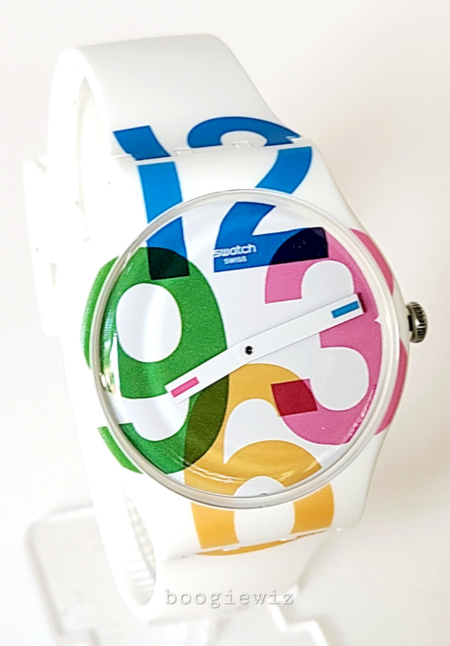 SWATCH, SWISS MADE, CLK WISE LARGE ASSORTED NUMBERS, SU0W117, NEW IN BOX
