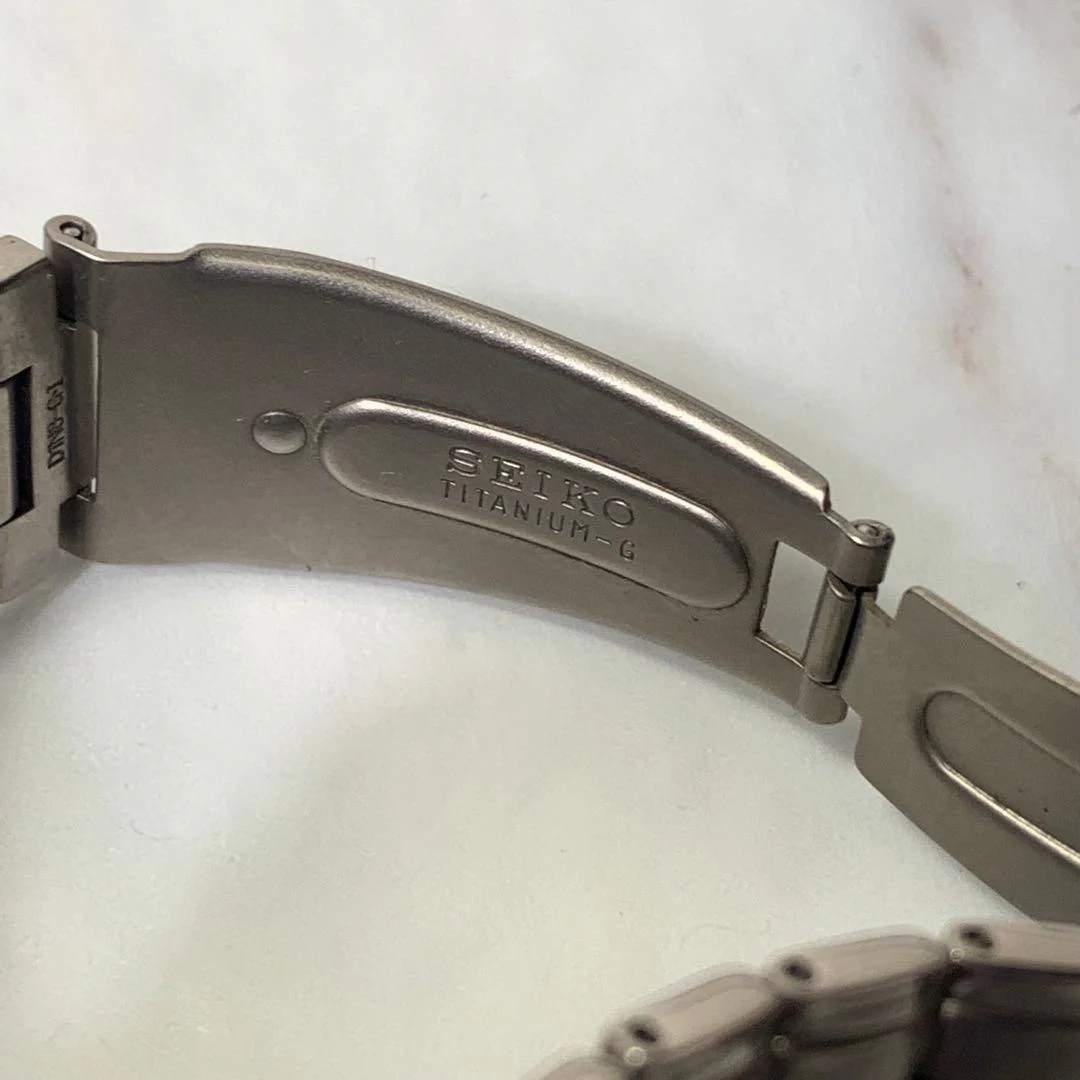 SEIKO 7N43-7B8 Titanium Solar Day-Date 35mm