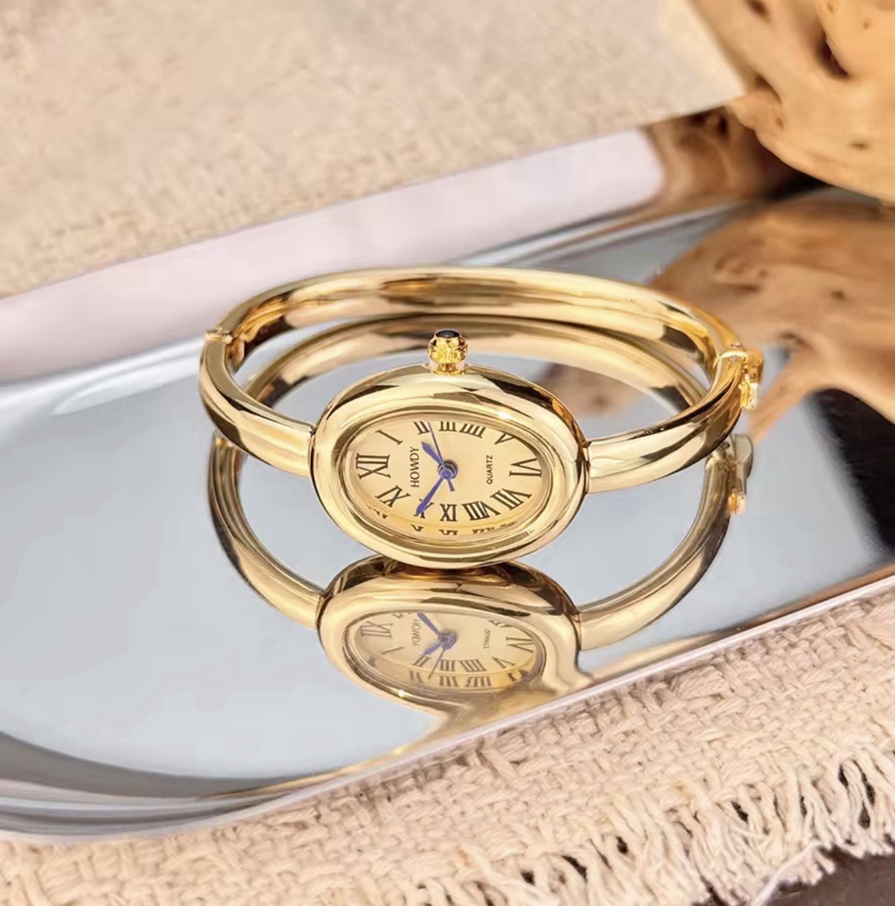 HOWDY Quartz Oval Bangle Wristwatch Roman Numerals Gold/Silver Tone Women’s