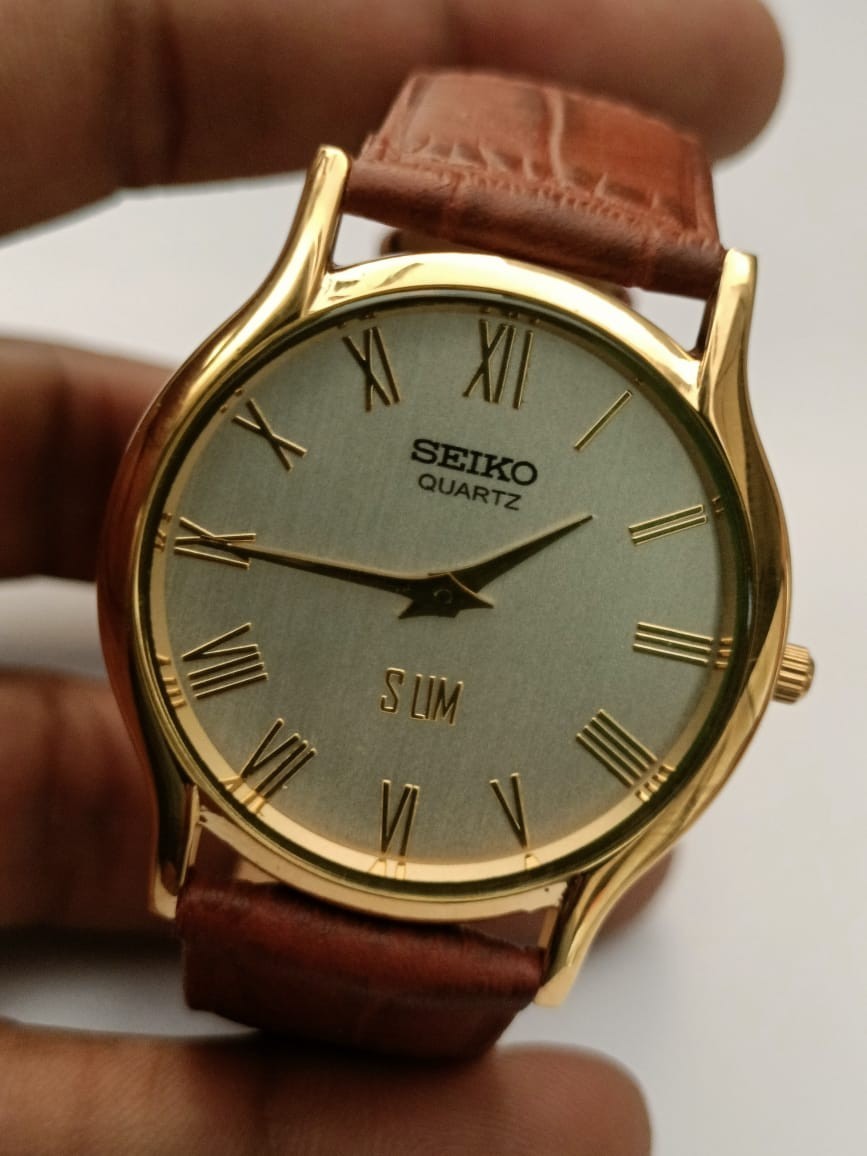 Vintage Seiko Quartz Japan Made White Dial Men’s Wrist Watch Looking Good