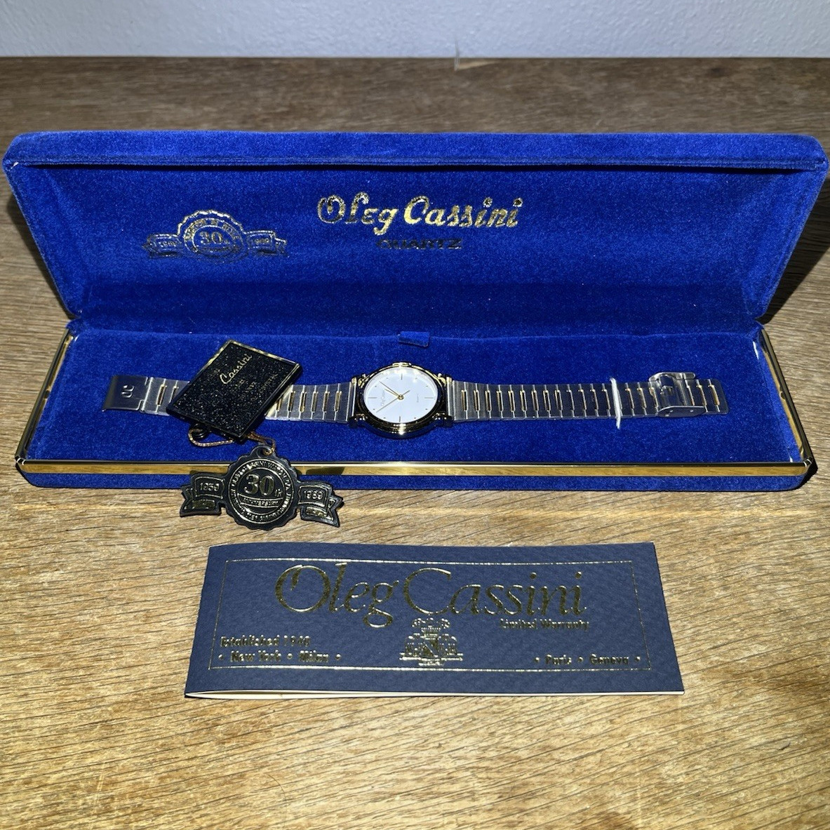 Oleg Cassini Quartz Analog Dress Watch White Dial Two-Tone Metal Bracelet Box