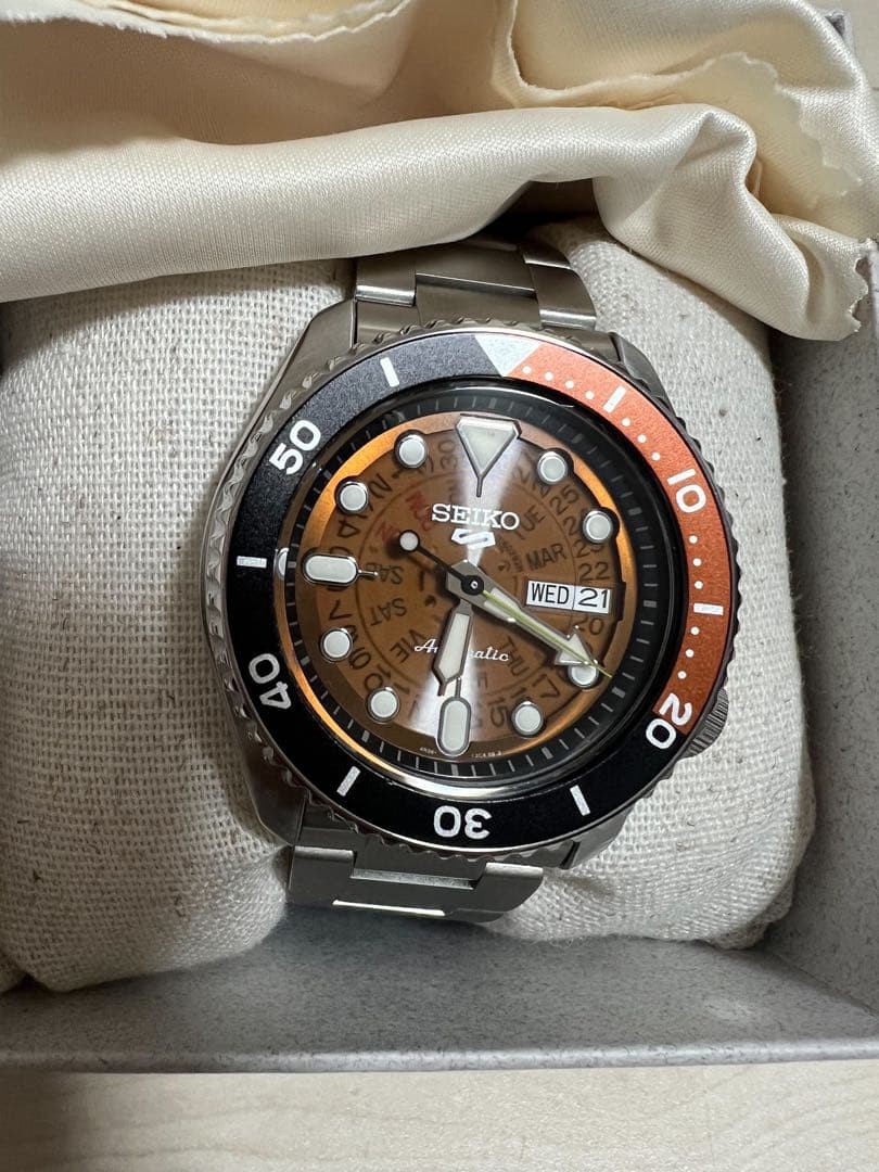 Seiko 5 Sports Automatic Watch Day-Date Brown Dial Black Orange Bezel