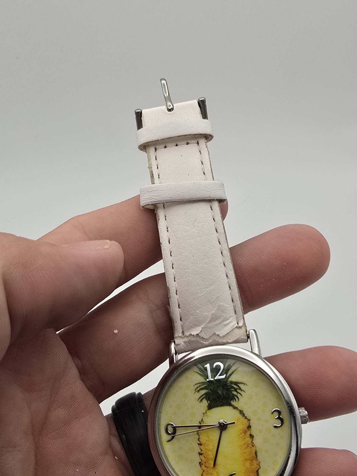 Avon Quartz Analog Wristwatch Pineapple Dial Silver SS Case White Leather Strap
