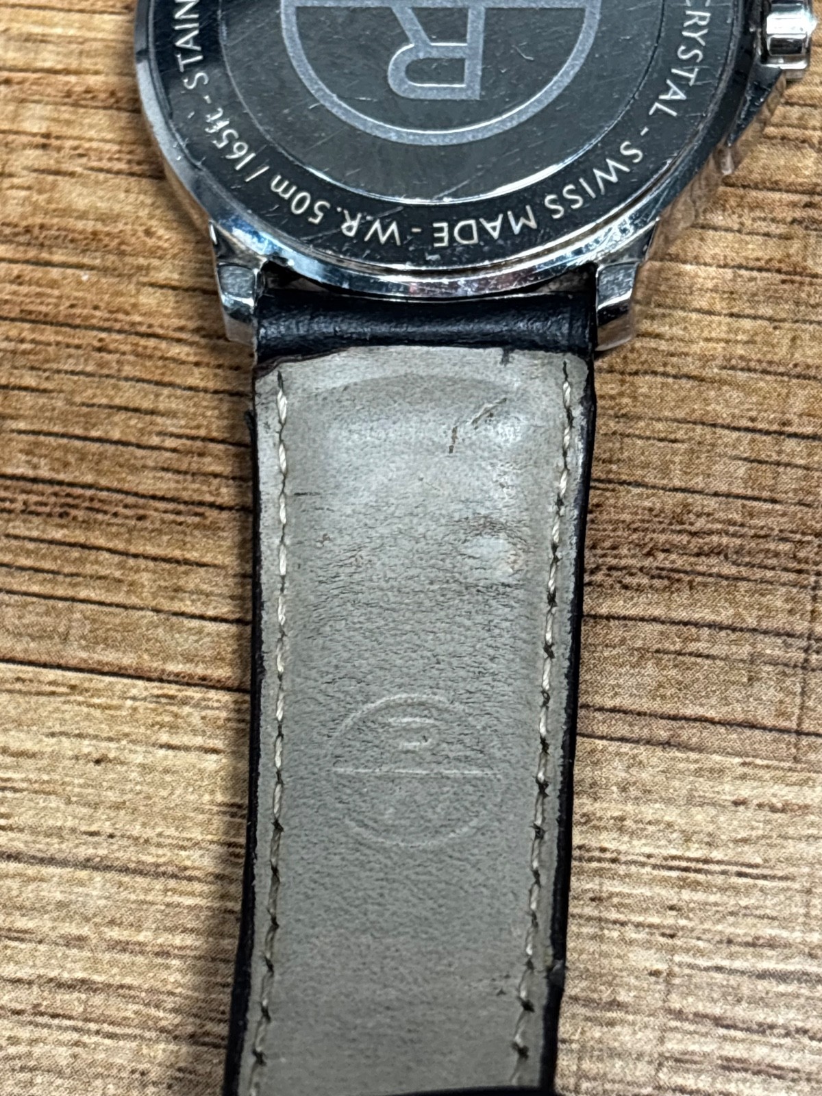 Raymond Weil mens watch, needs new battery, strap shows wear