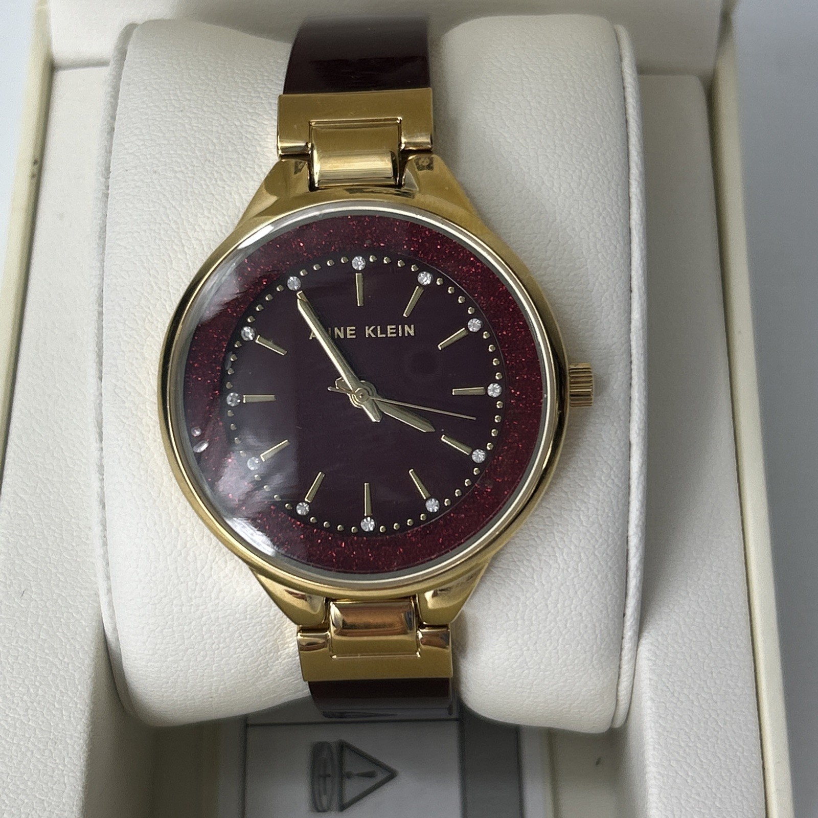 Anne Klein Women’s Quartz Burgundy Resin Gold-Tone Watch – AK/1408BYBY