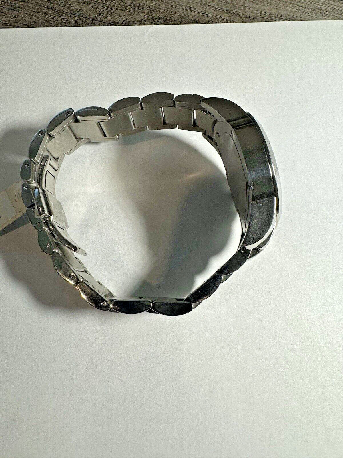 Michaels men’s stainless steel watch with screw down crown, sapphire crystal