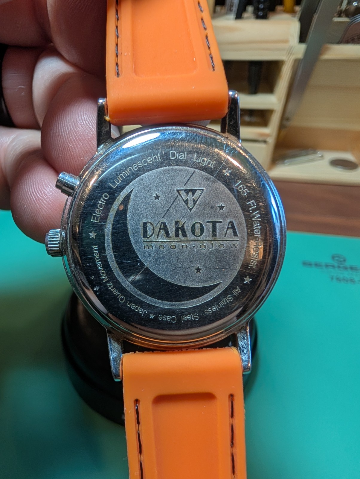 Dakota Moon-Glow Quartz Analog Watch Date Luminous White Dial Orange Strap