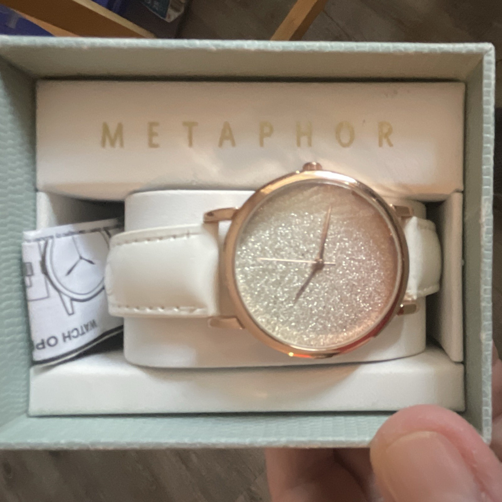 Metaphor Women’s Quartz Analog Dress Watch Silver Glitter Dial White Strap Box