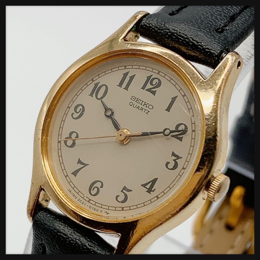 SEIKO 2C21-0170 Quartz Women’s Watch Ivory Dial Gold Case Black Strap