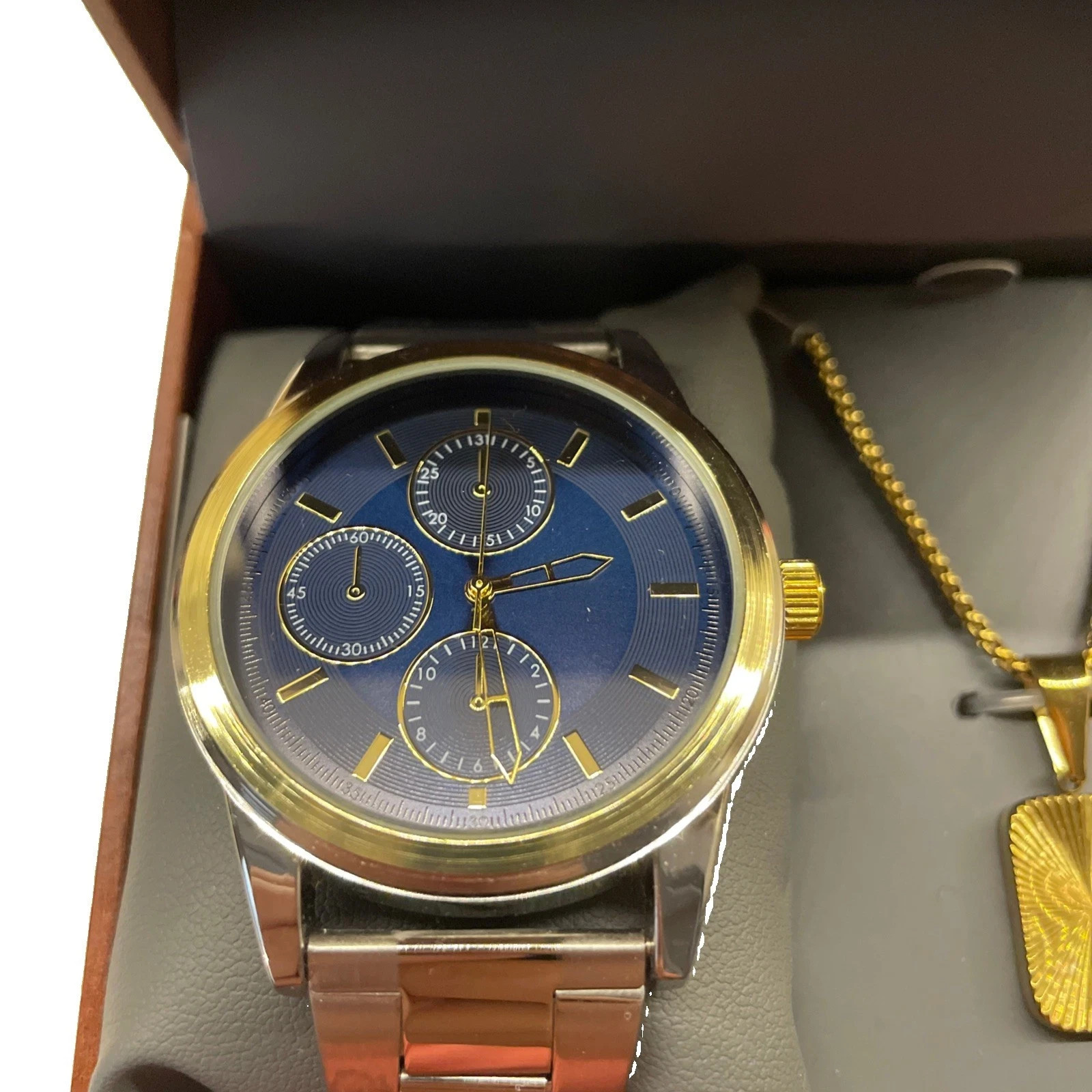 Folio Men’s Dress Wristwatch Silver with Gold Dial and Blue Face