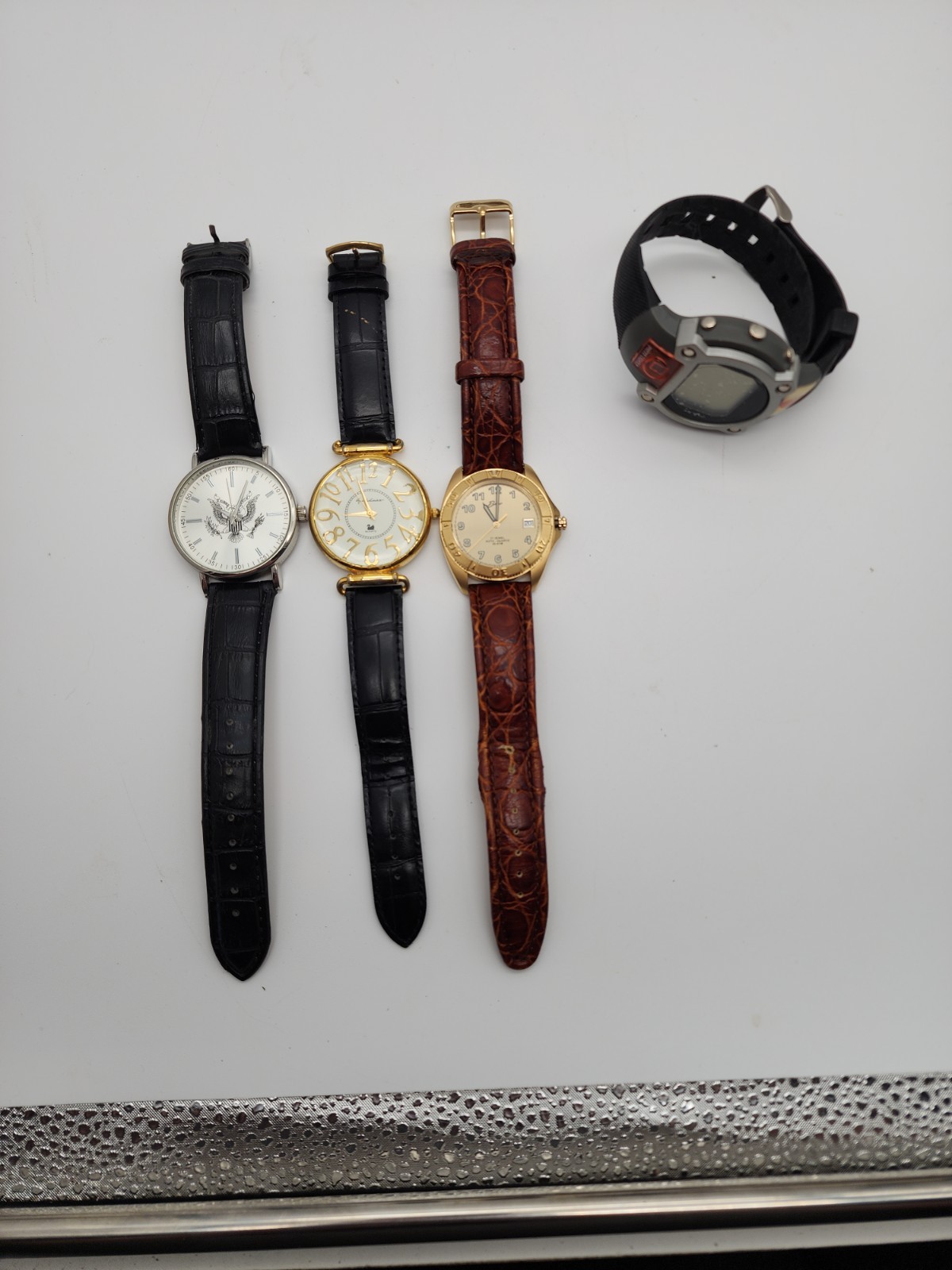 lot of 5 leather and rubber band Watches for Parts Or repair