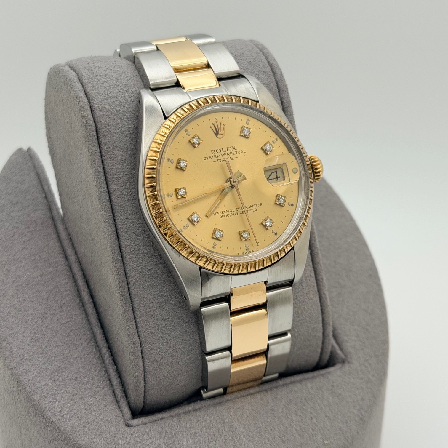 Rolex Date 1505 34mm Champagne Diamond Dial 18k Yellow Gold Stainless Steel