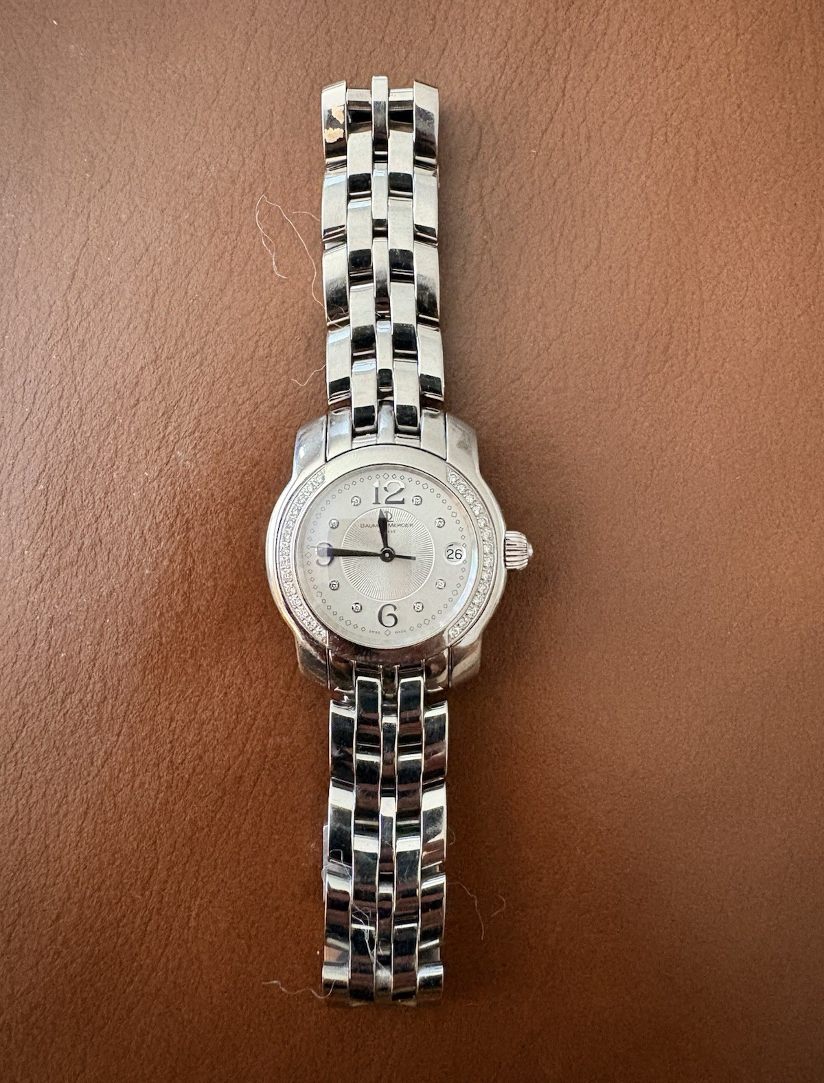 Baume & Mercier Capeland 28mm Quartz Diamond Bezel Silver Dial- paperwork shown