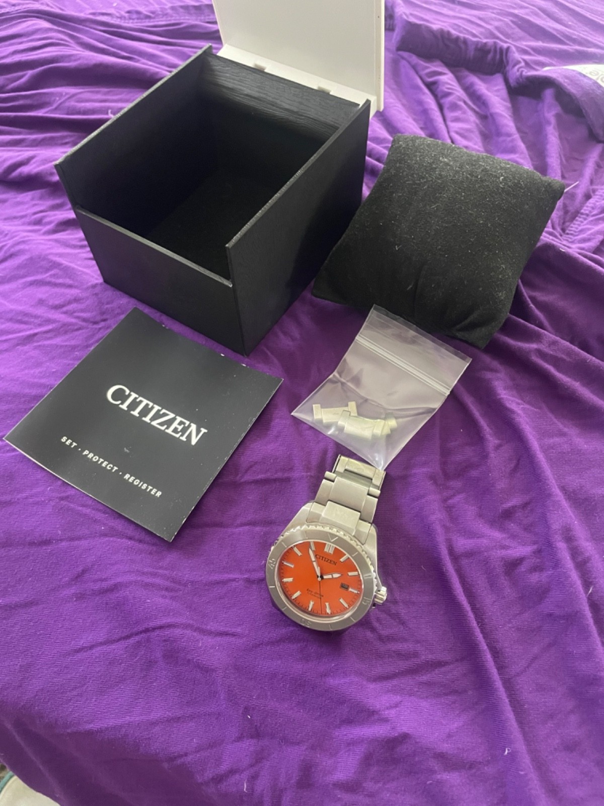 Citizen Men’s Watch Brycen Eco-Drive Orange Dial Titanium Bracelet AW1840-50X