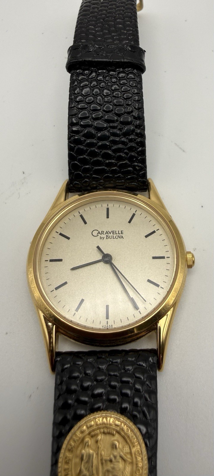 Bulova Caravelle Quartz Vintage Gold Tone Round Dress Watch Black Leather Strap