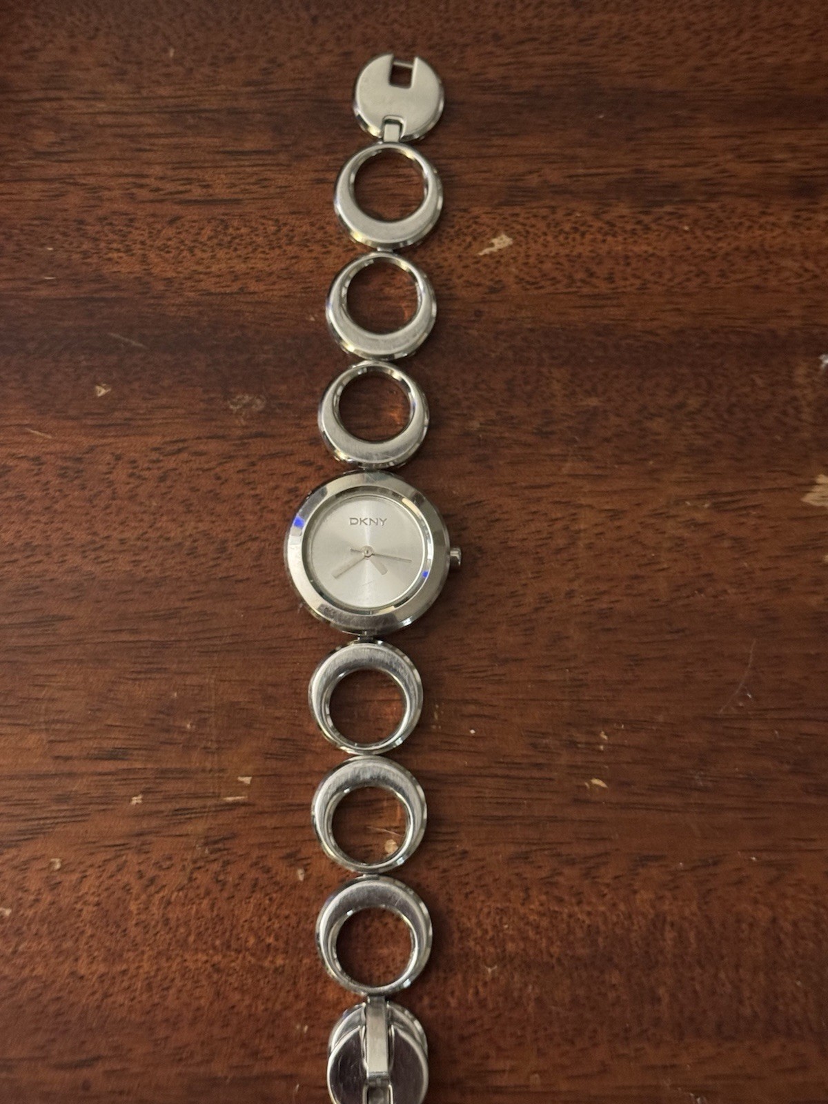 DKNY Women’s Quartz Analog Watch Silver Sunburst Dial Metal Bracelet