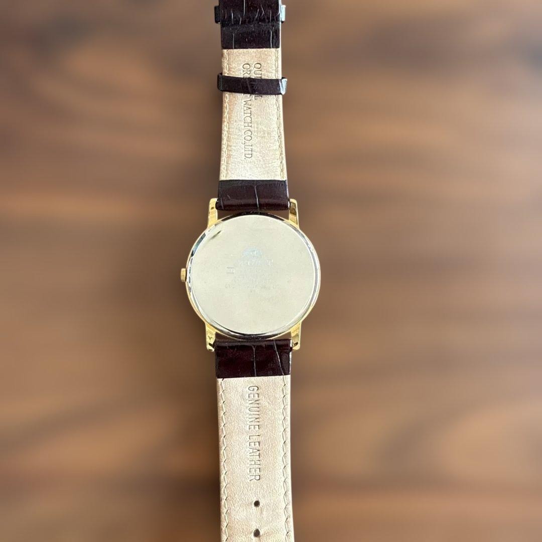 Orient Classic Capital UG1R-A0-A Gold Quartz Day Date Leather Men’s Dress Watch
