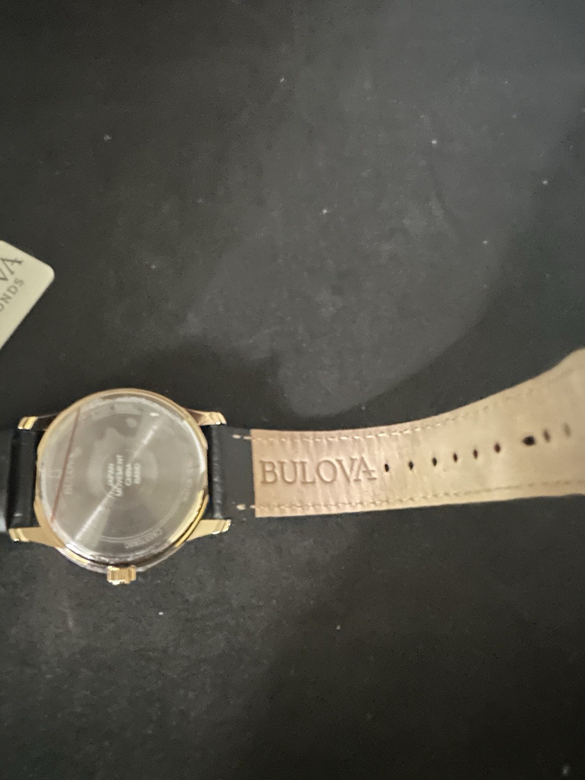 Bulova Diamonds Quartz Dress Watch Black Dial Gold Case Black Leather Strap Box