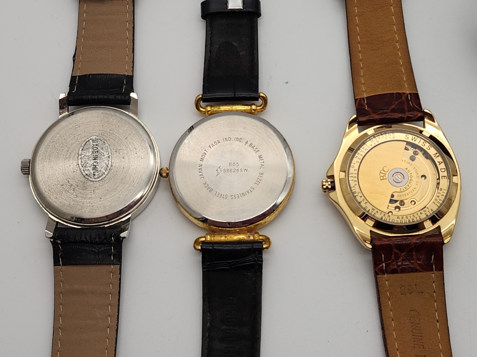 lot of 5 leather and rubber band Watches for Parts Or repair