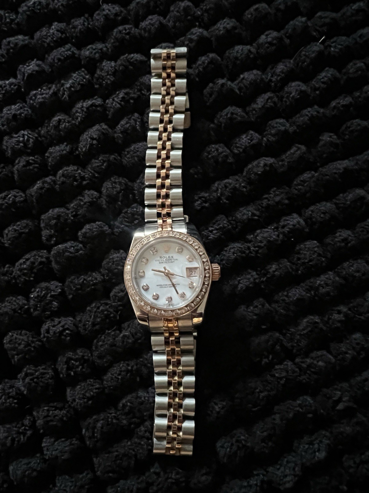 This watch is a 28 mm Rolex Lady-Datejust, model 279381RBR with diamonds
