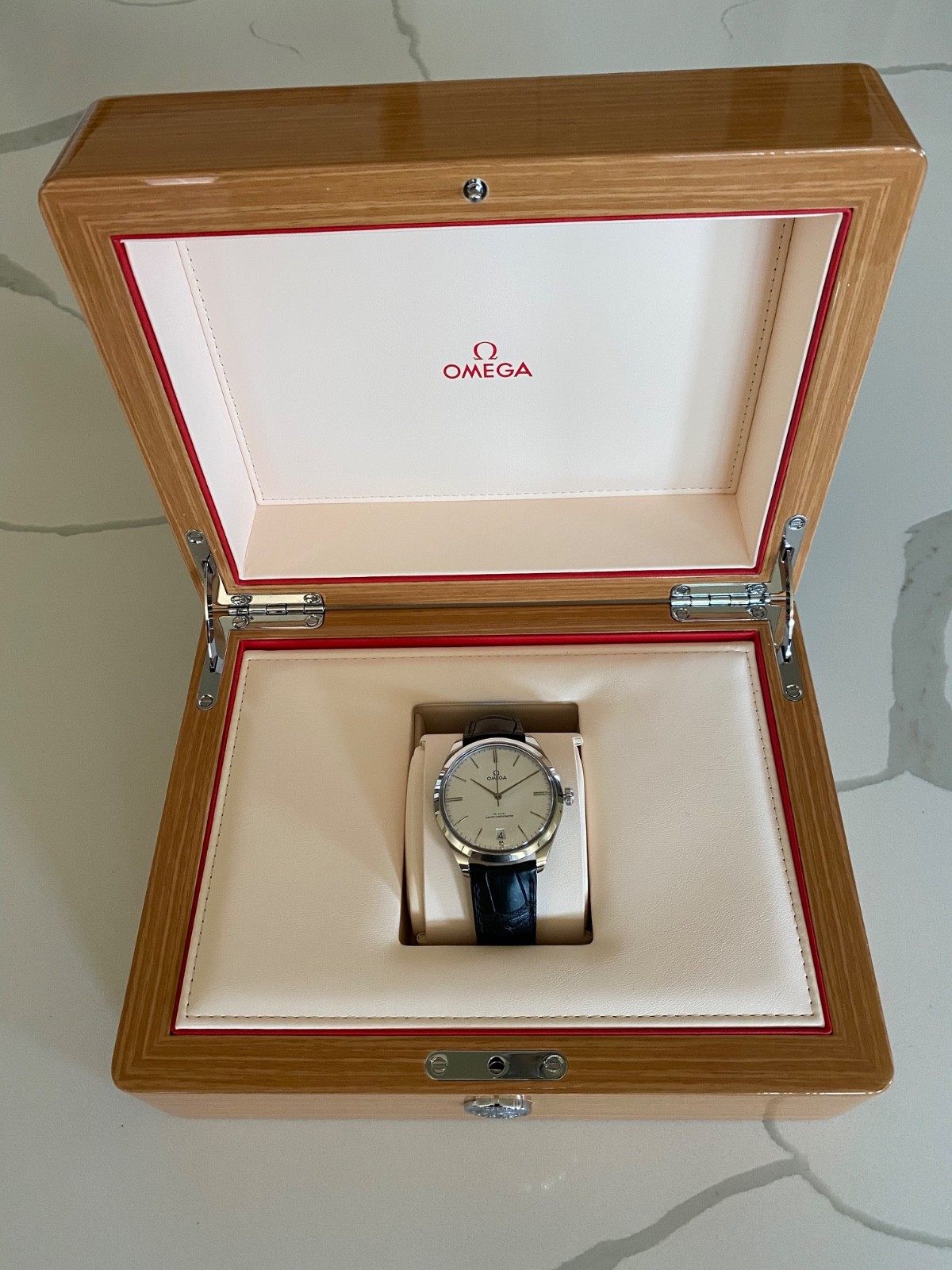 Omega De Ville Tresor 40 mm watch, steel case with black leather strap