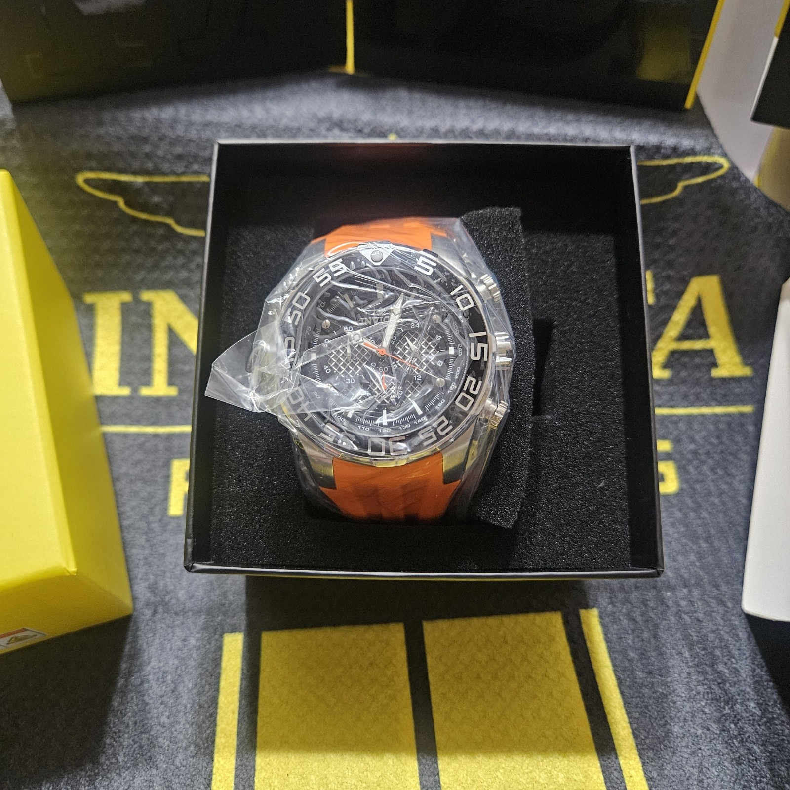 Invicta Mens Speedway Chronograph 50mm Black Dial Orange Strap Quartz Watch