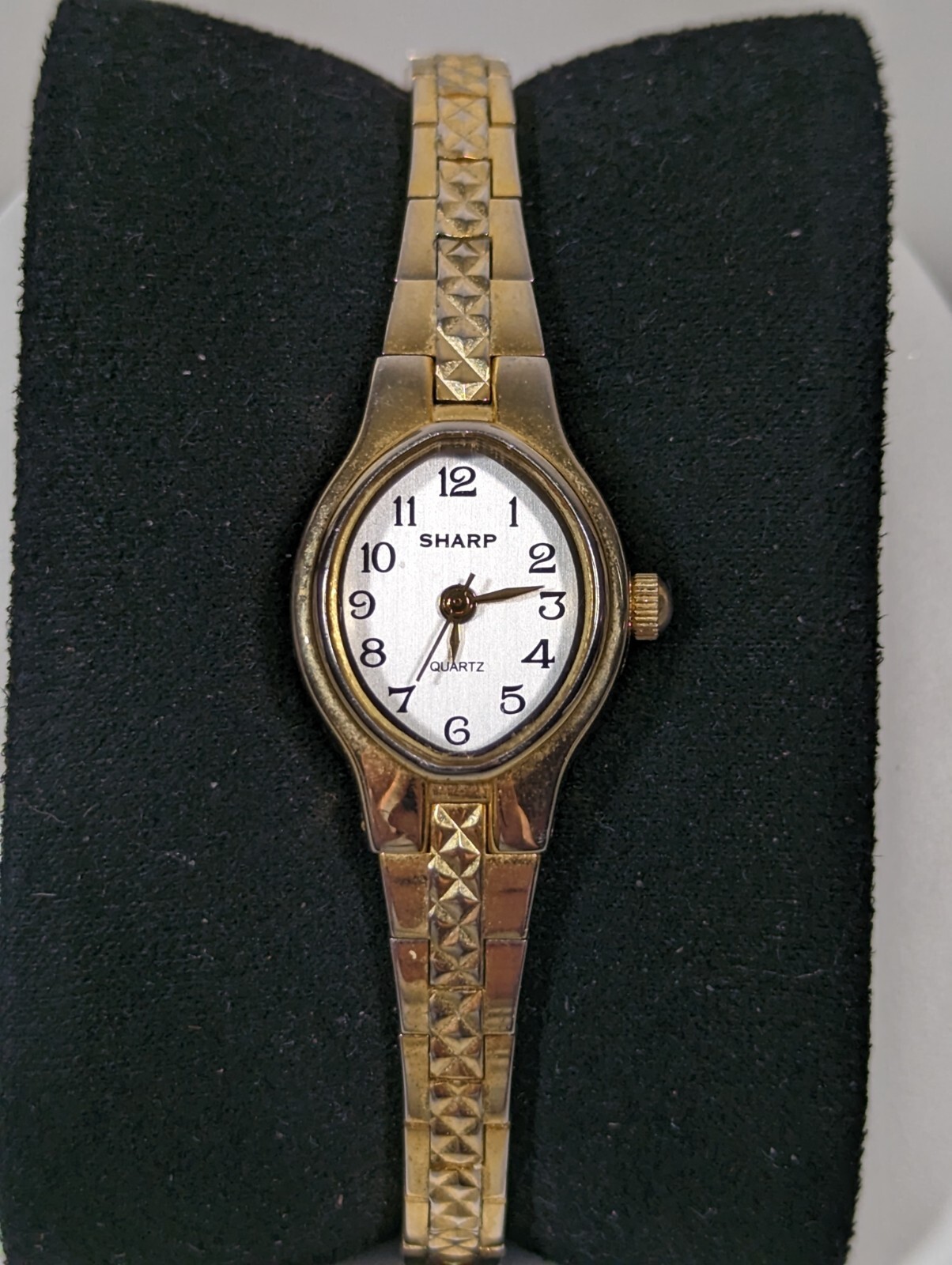 Sharp Womans Silver Dial GoldTone Oval Case Textured Bracelet Band Watch 6.75 in