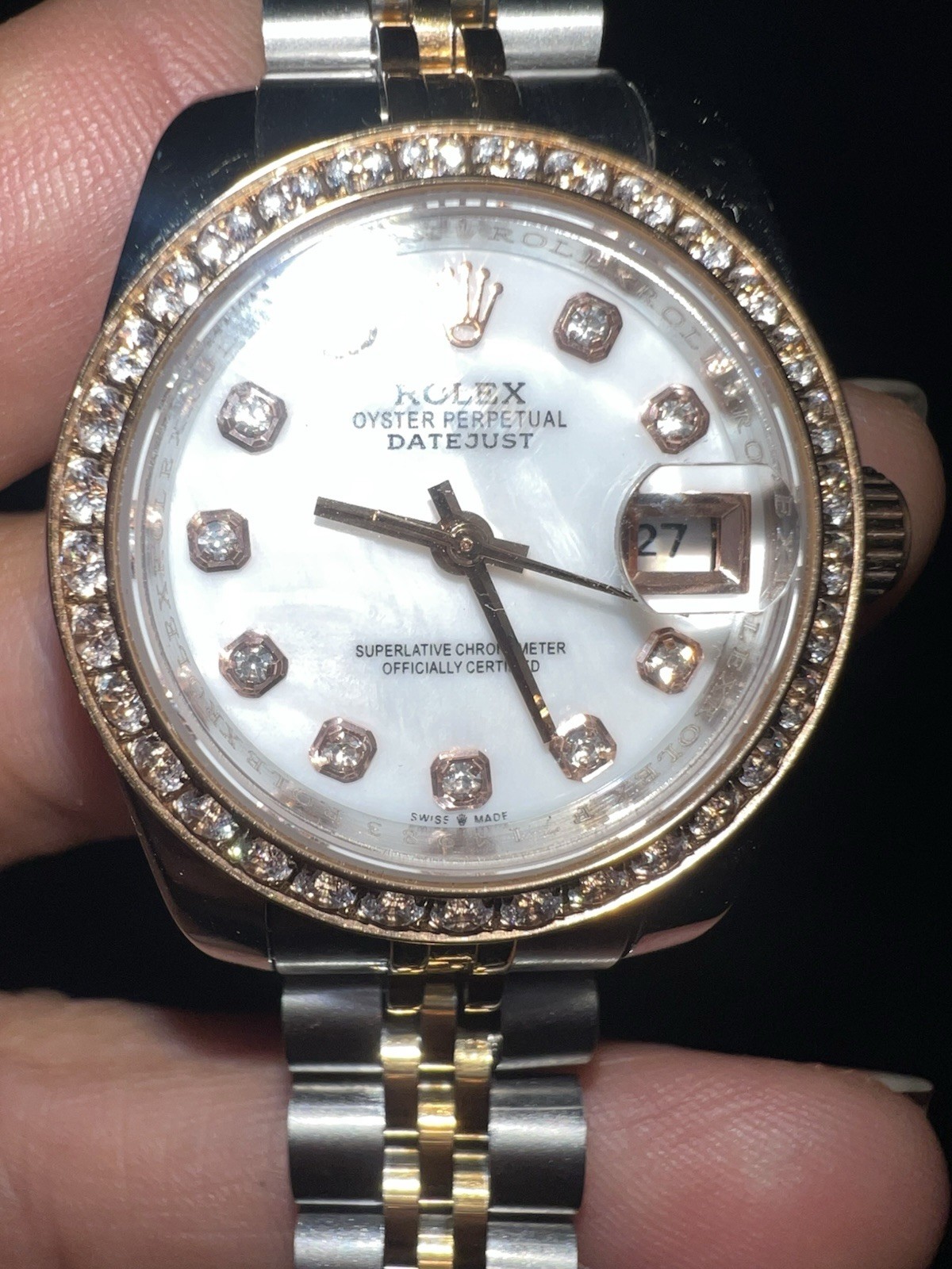 This watch is a 28 mm Rolex Lady-Datejust, model 279381RBR with diamonds