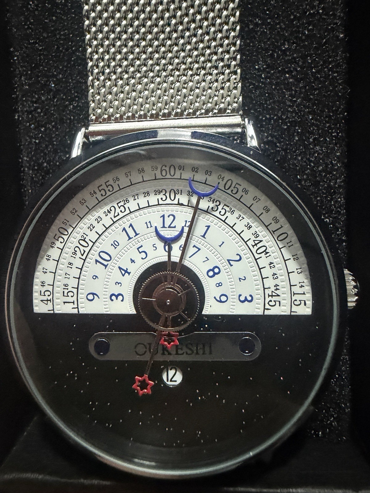 OUKESHI Orbit Dial Quartz Watch Mens Moon and Stars Pointer Steel Mesh Band