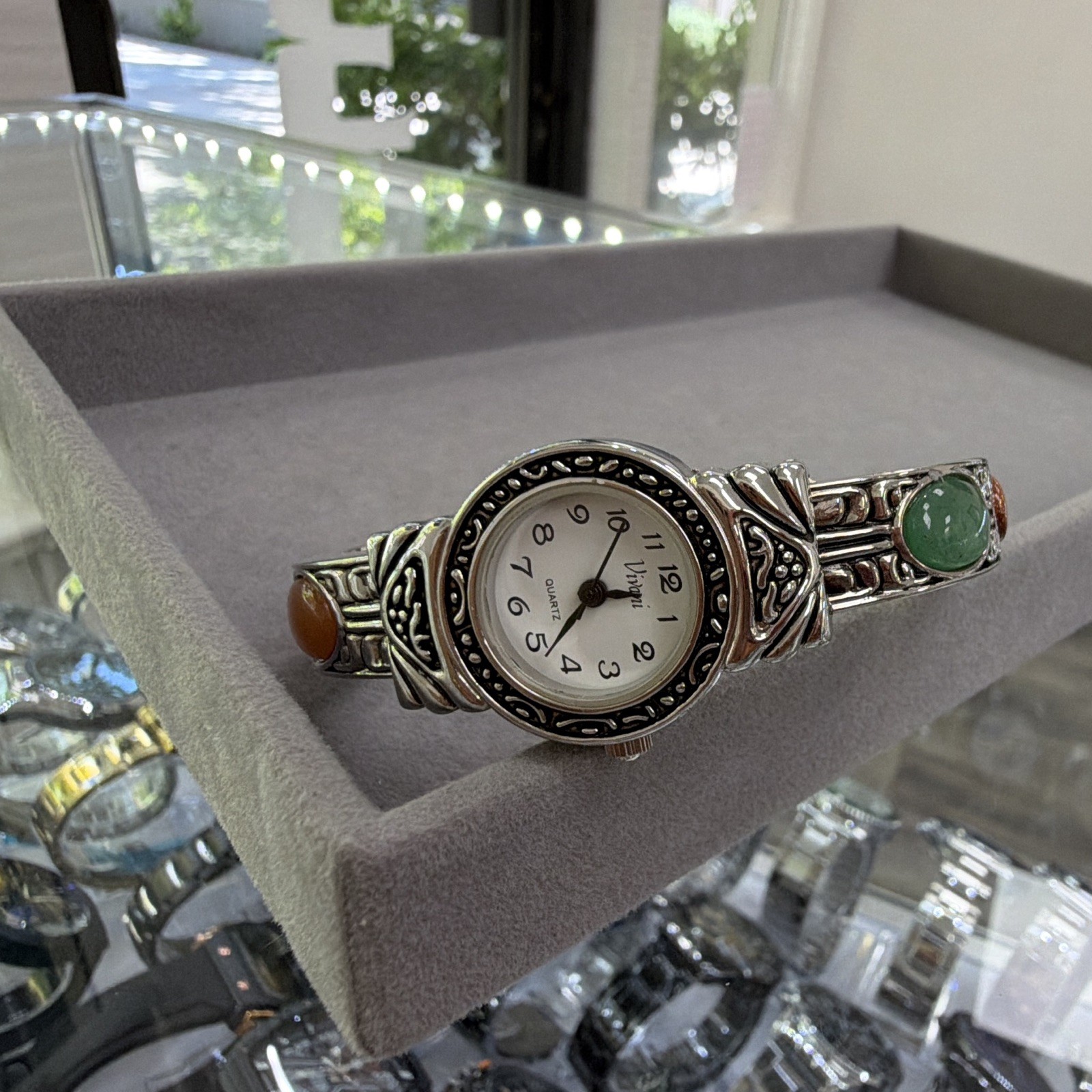 Vivani Women’s Quartz Analog Wristwatch Silver Tone Bangle White Dial Stones
