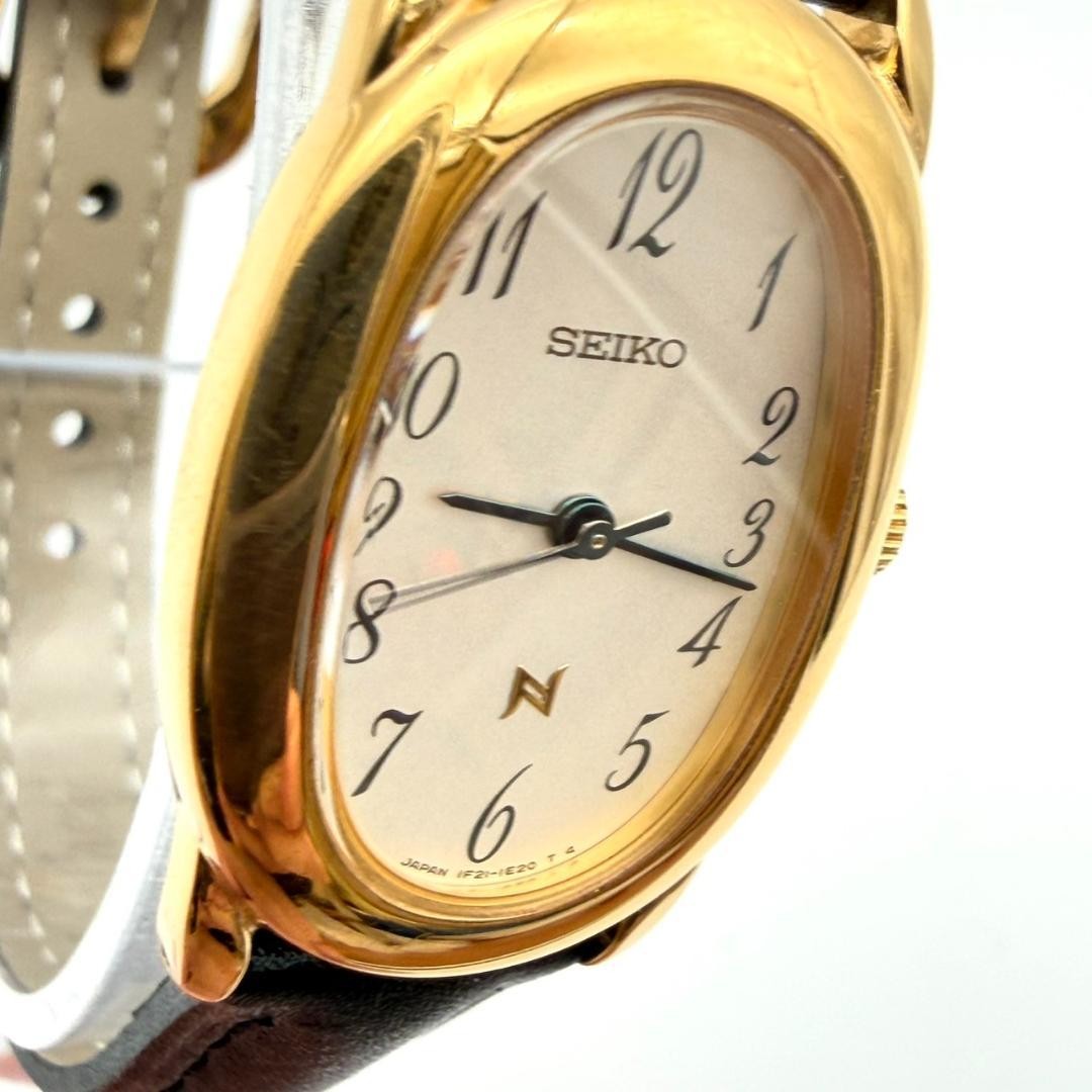 Excellent condition Seiko watch, new battery, new strap, oval shape, gold, women