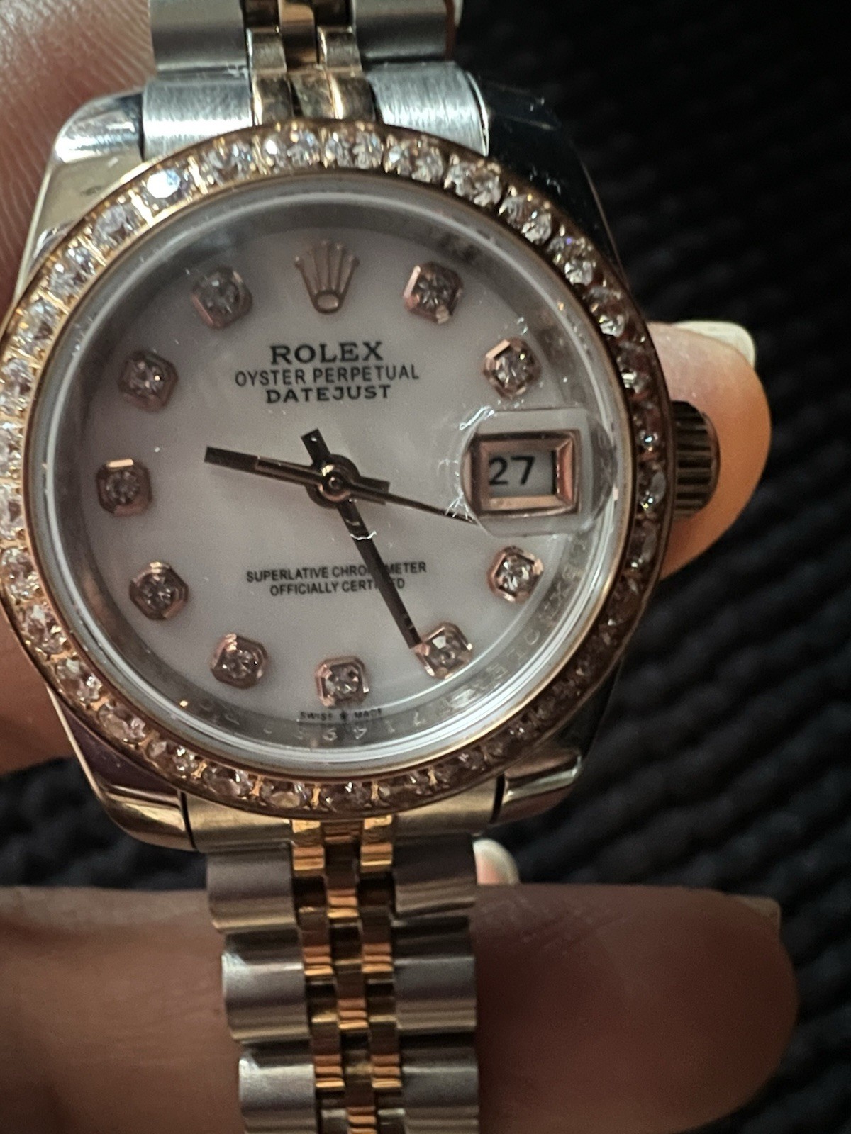 This watch is a 28 mm Rolex Lady-Datejust, model 279381RBR with diamonds