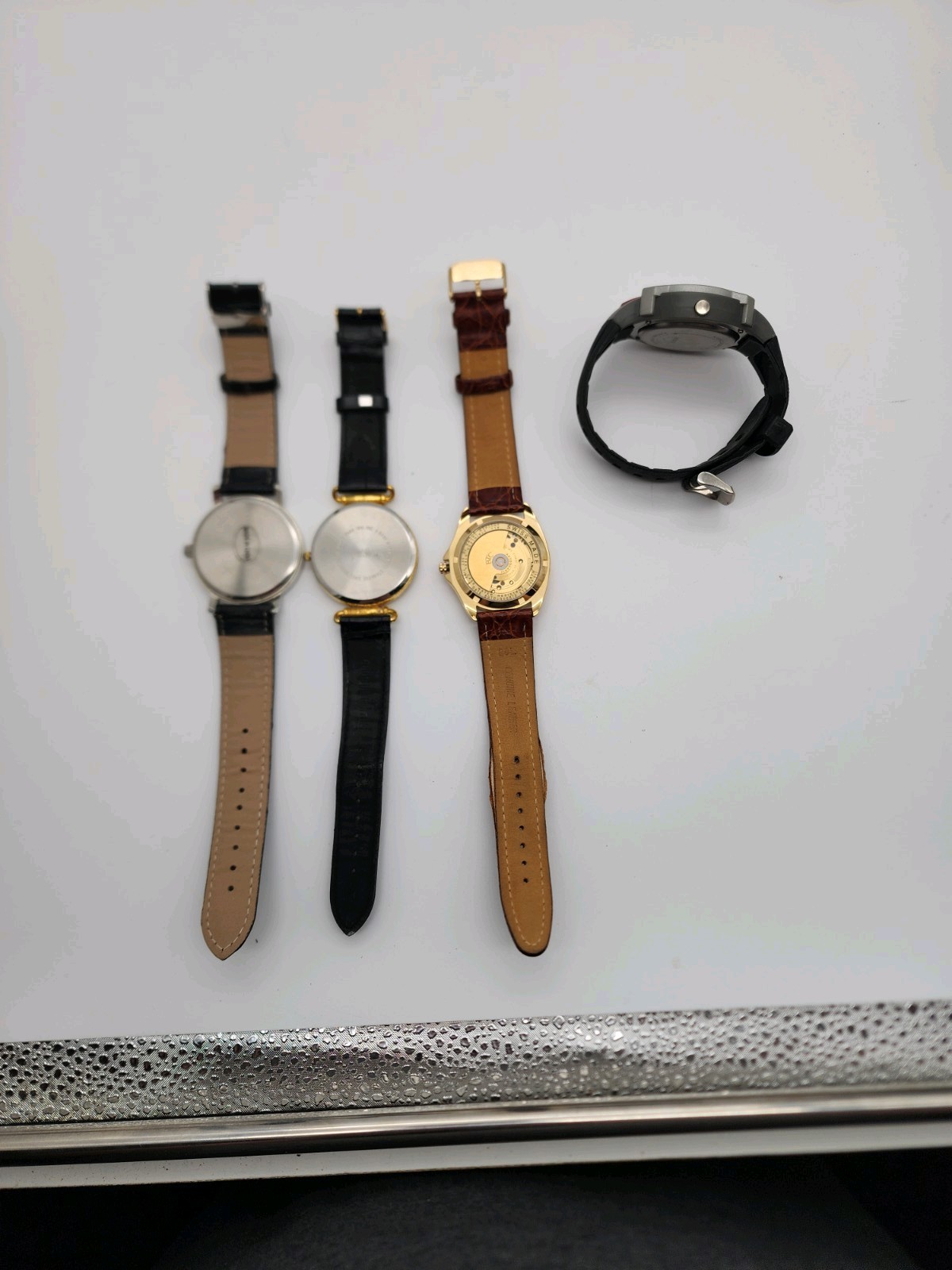 lot of 5 leather and rubber band Watches for Parts Or repair