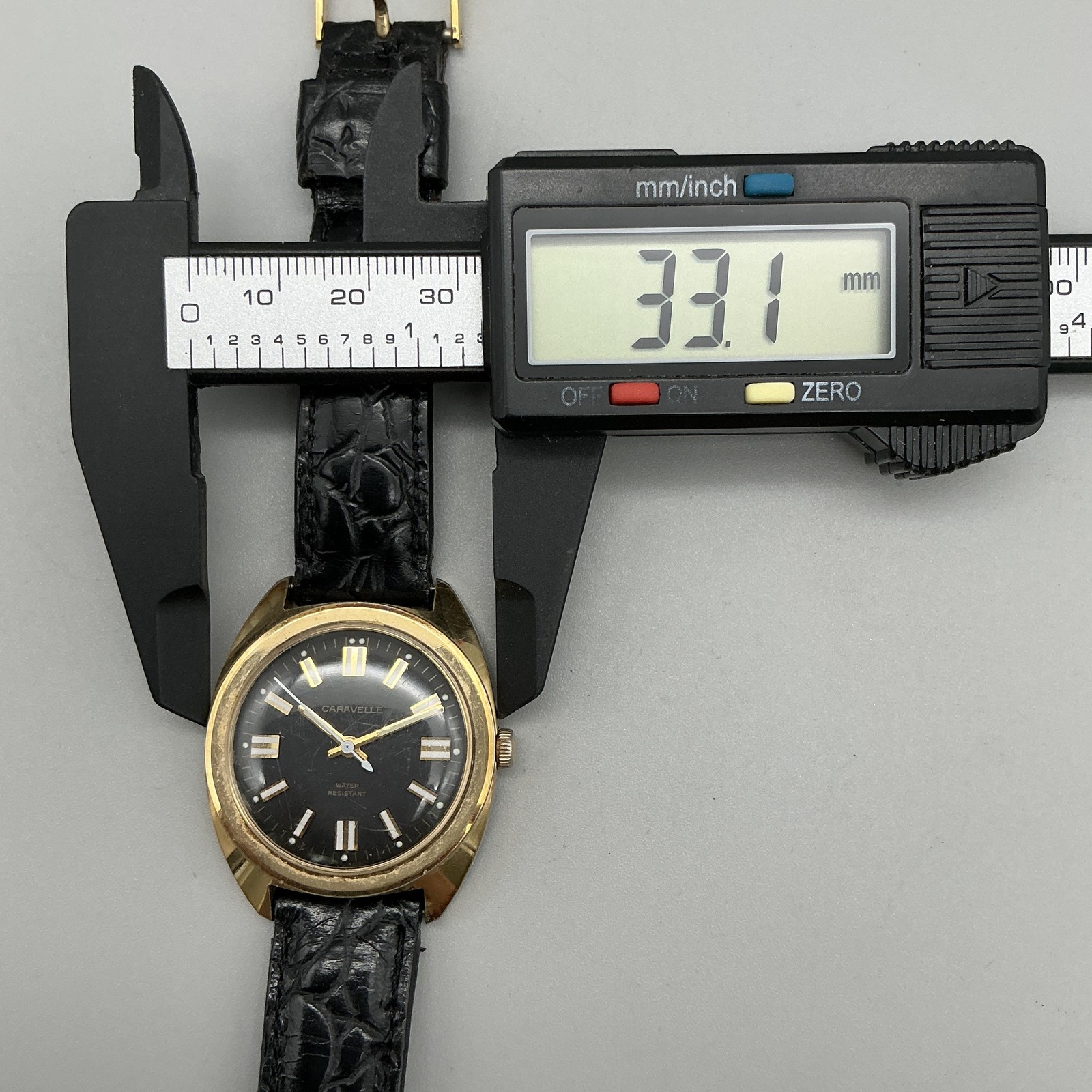 Vintage Caravelle Mens Watch 33mm Black Dial Gold Tone Case Manual Leather Strap