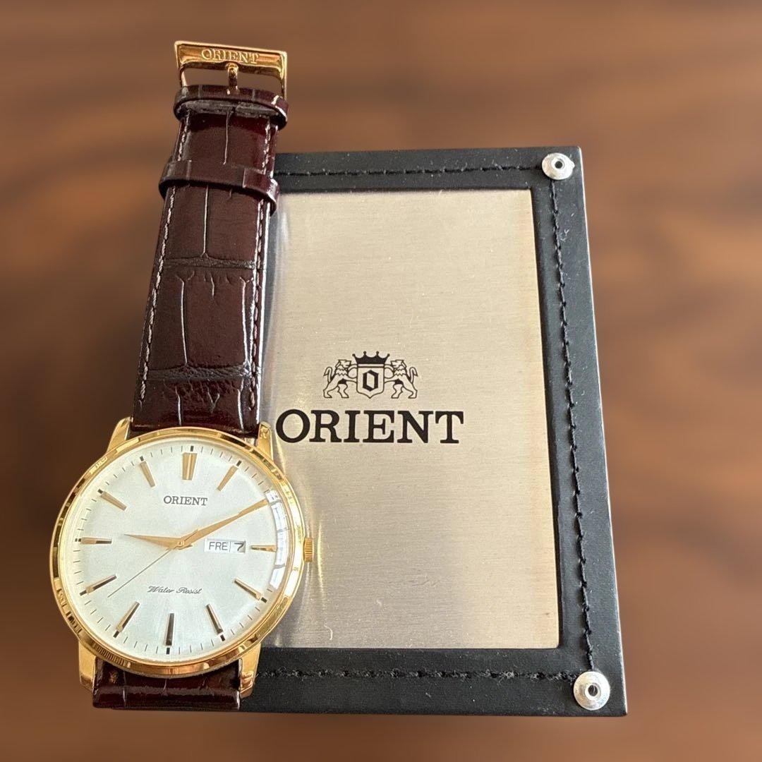 Orient Classic Capital UG1R-A0-A Gold Quartz Day Date Leather Men’s Dress Watch