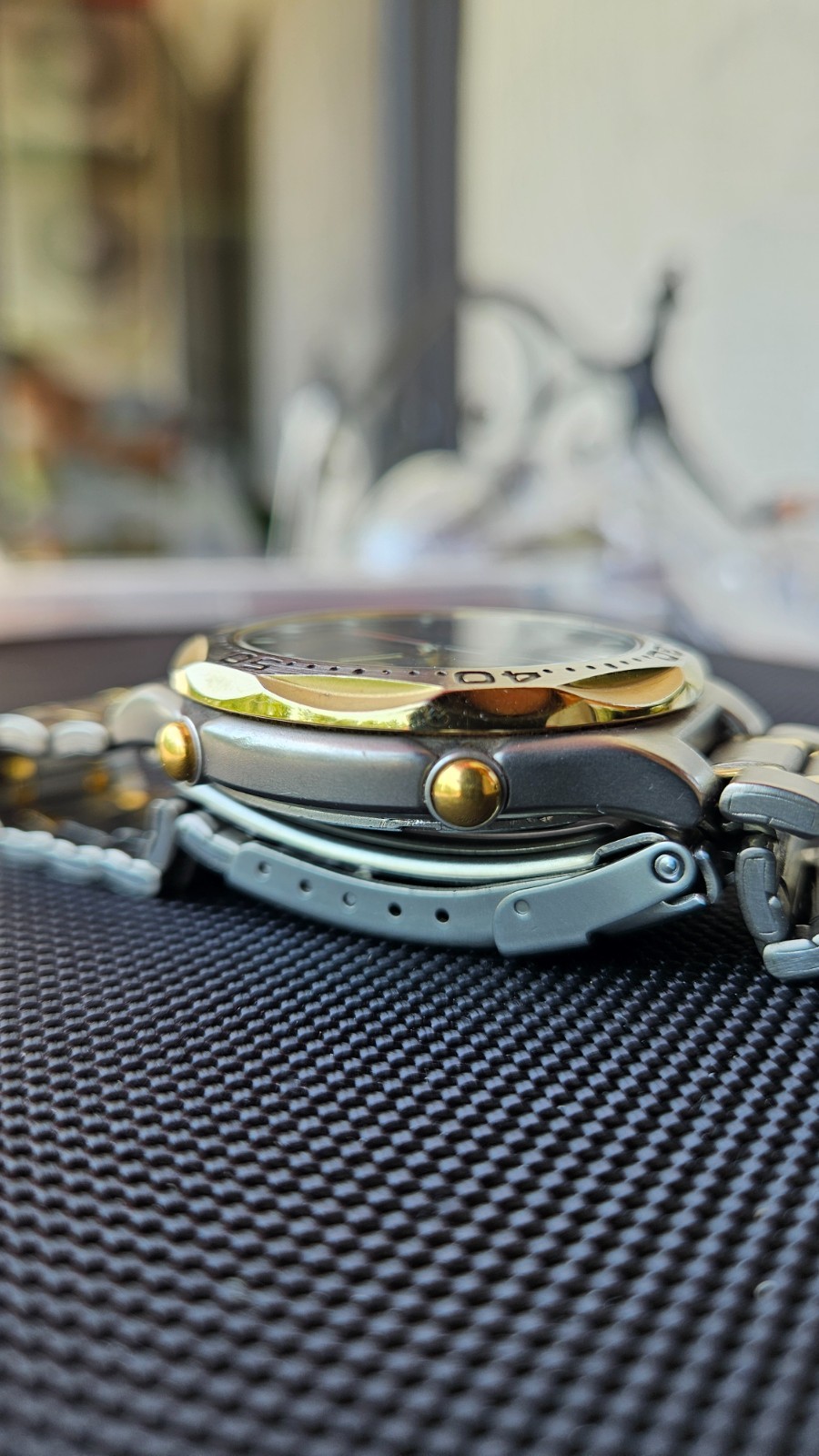 Citizen Promaster Pace Timer Titanium WR100 C130-089685 two-tone gold accents