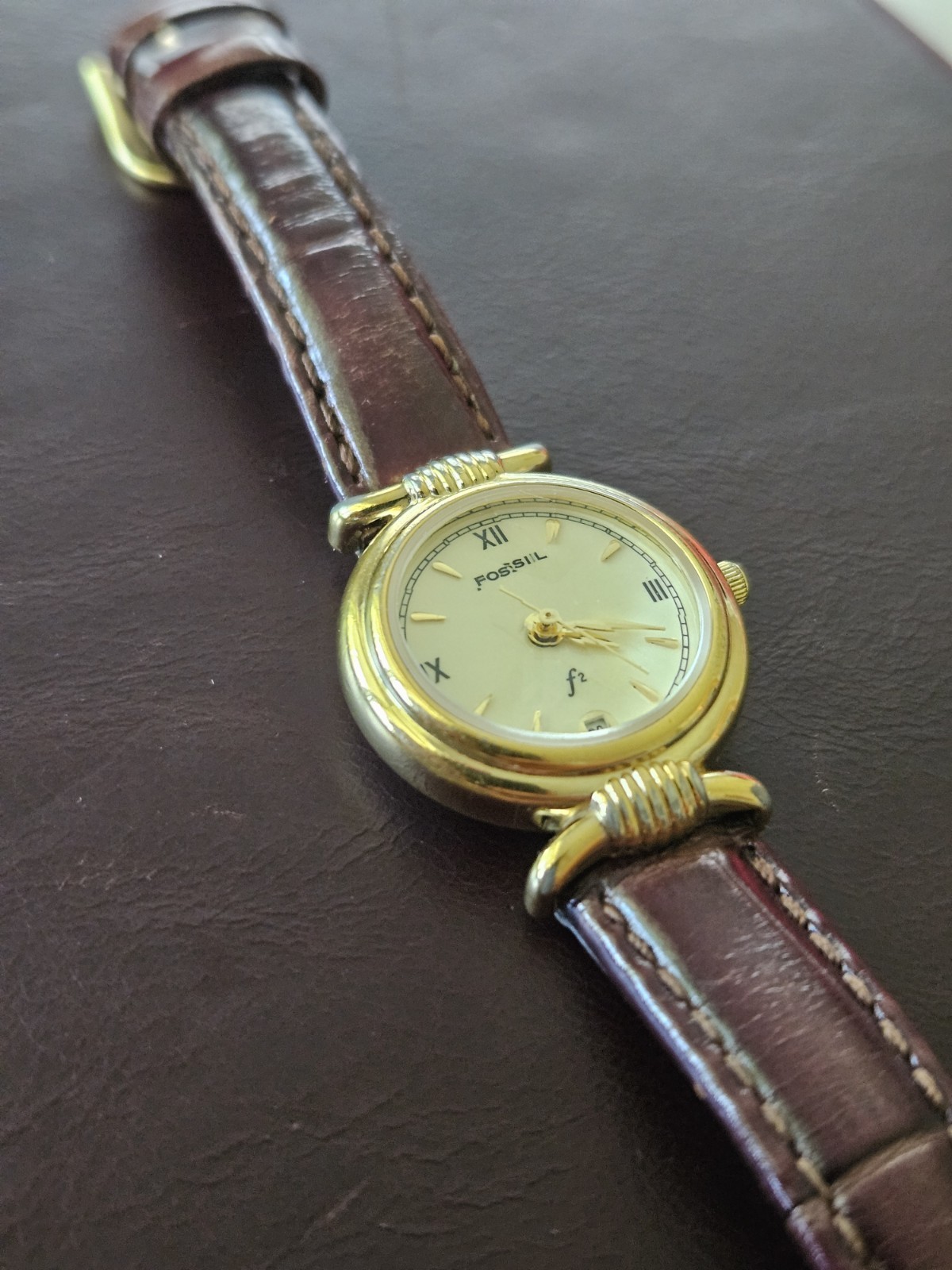 Fossil F2 Women’s Quartz Gold Tone Watch Brown Leather Band Date Roman Dial