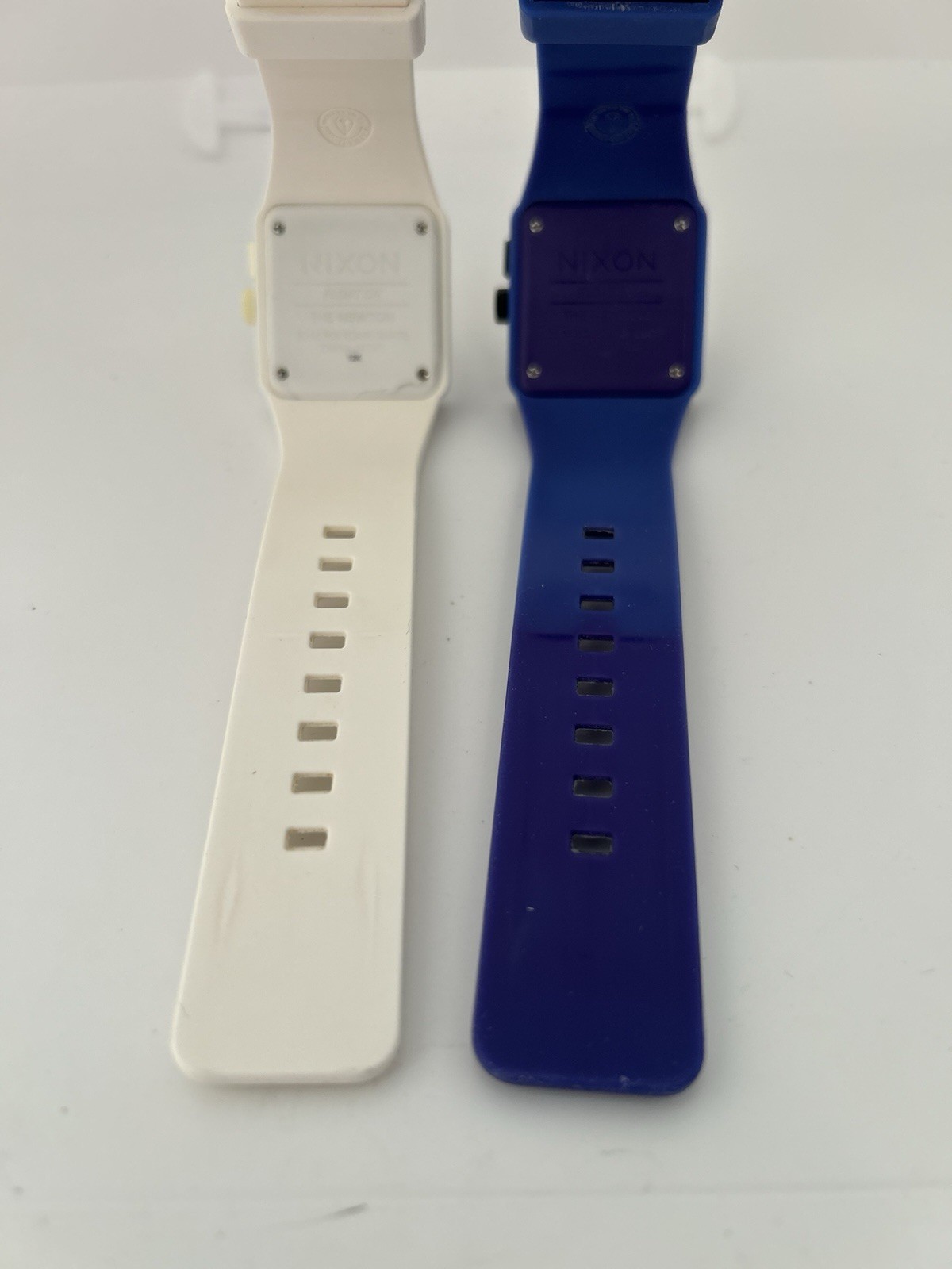 Two Nixon Float On The Newton Watch Purple And Blue And White