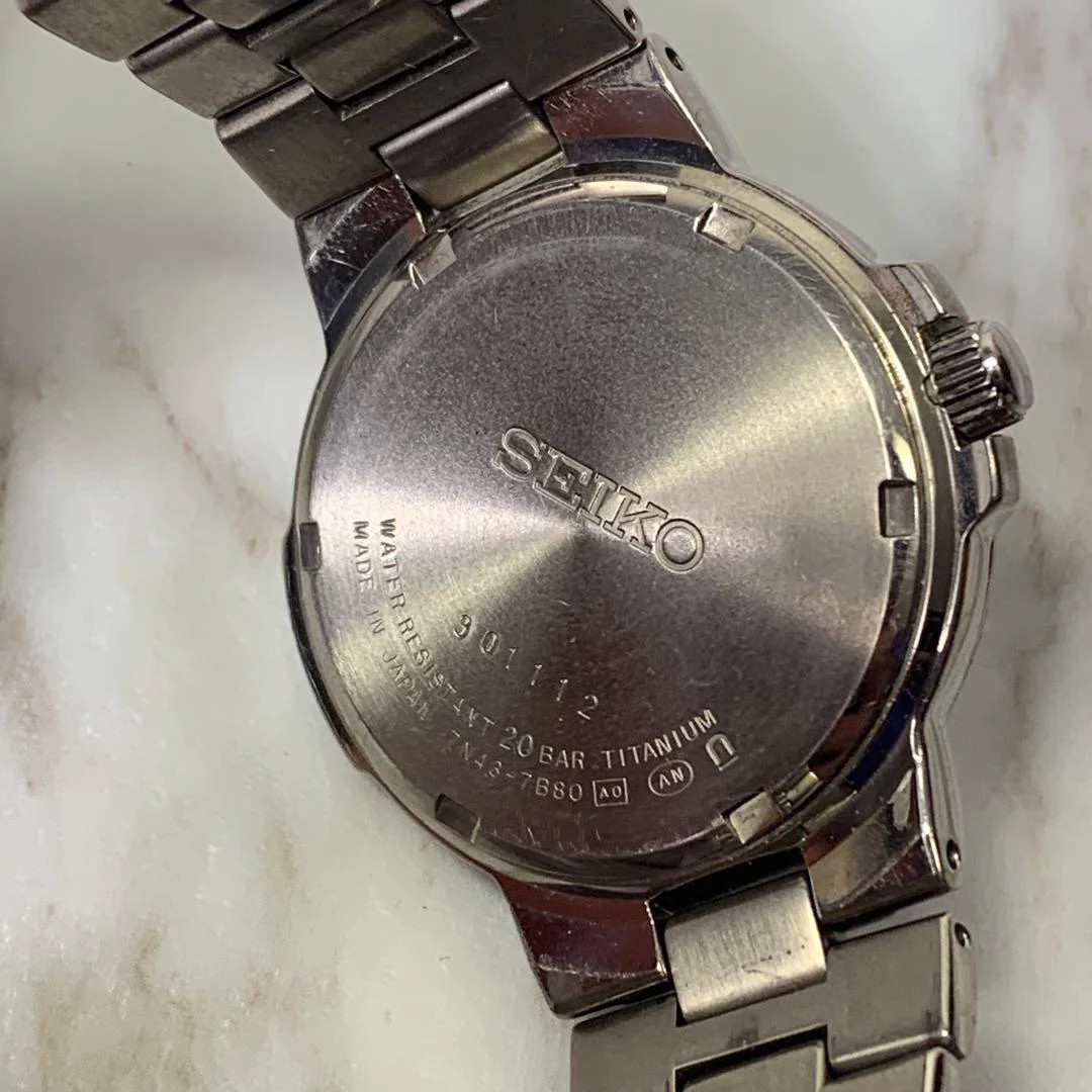 SEIKO 7N43-7B8 Titanium Solar Day-Date 35mm