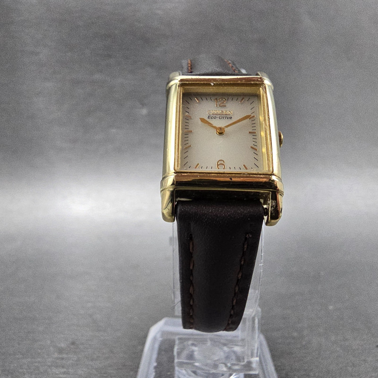 Citizen Eco-Drive Tank Watch Women 18mm Champagne Dial Gold Tone Rectangle Runs