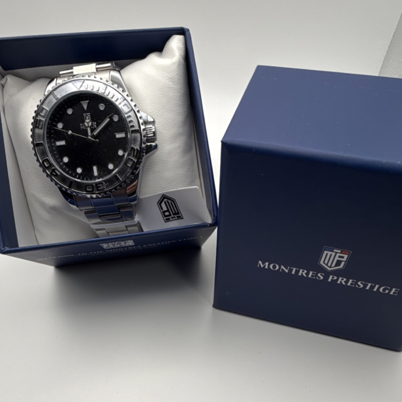 Montres Prestige Men’s Silver Stainless Steel Black Dial Dot Baton Indexes Watch