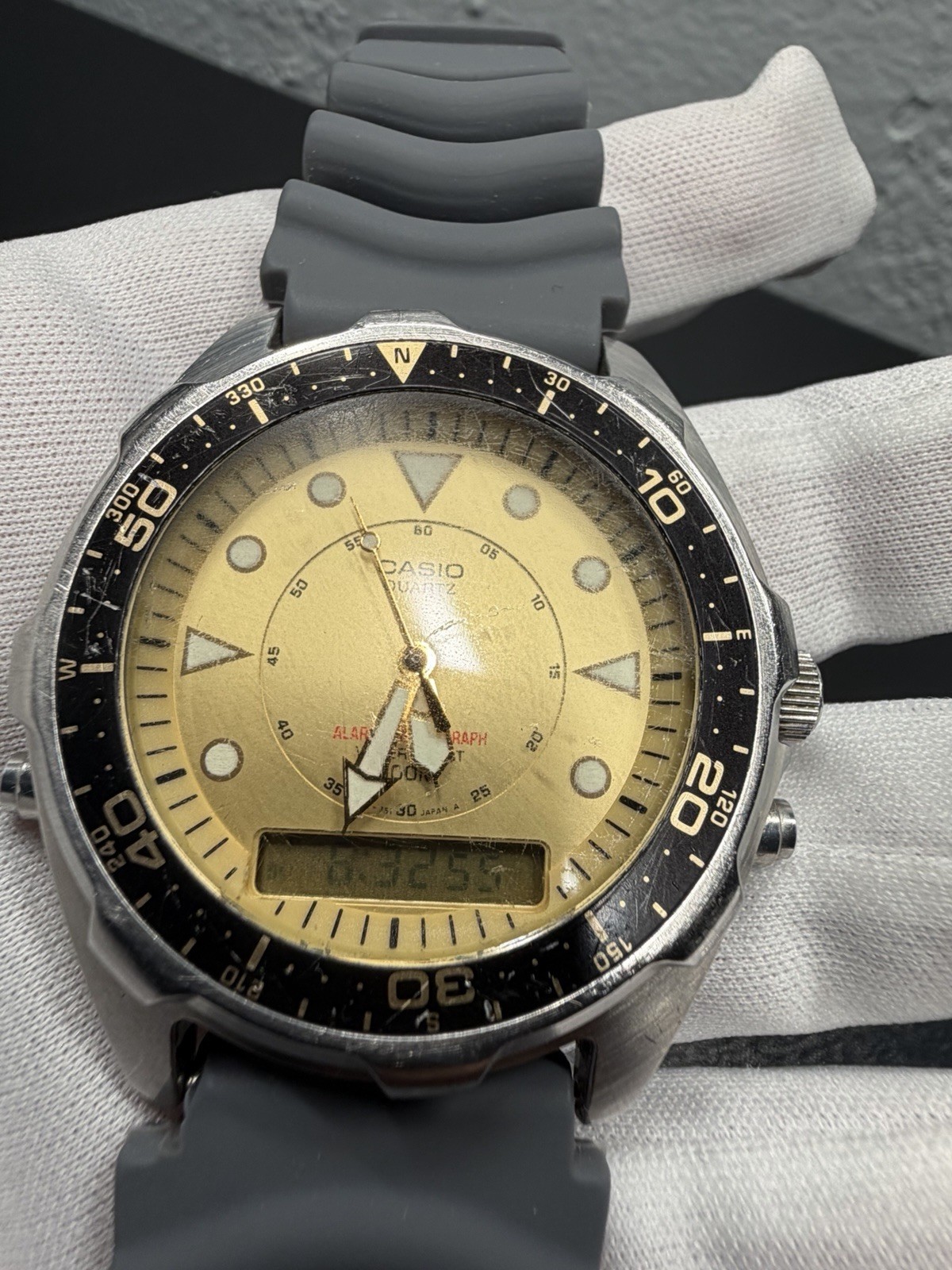 Casio Ana-Digi Quartz Chronograph Alarm Compass 40mm Gold Dial Gray Resin Arni