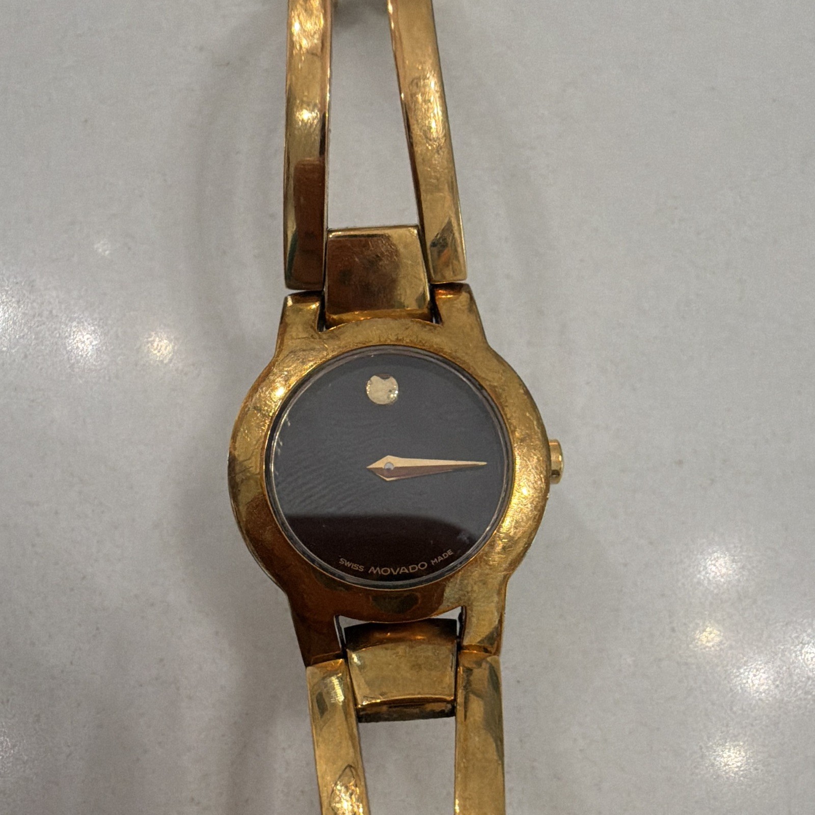 Movado Museum Women’s Dress Quartz Swiss Made Black Dial Gold Tone Bracelet