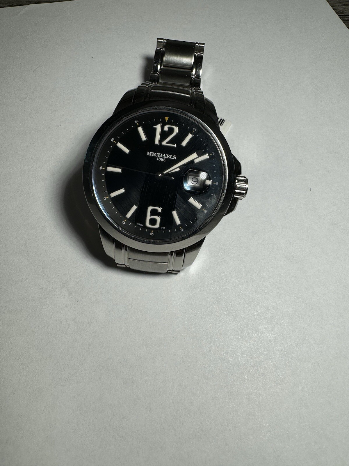 Michaels men’s stainless steel watch with screw down crown, sapphire crystal