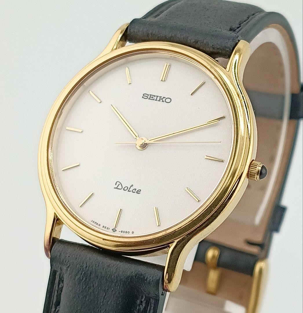 Excellent condition/working, new battery, SEIKO DOLCE watch, aftermarket strap,