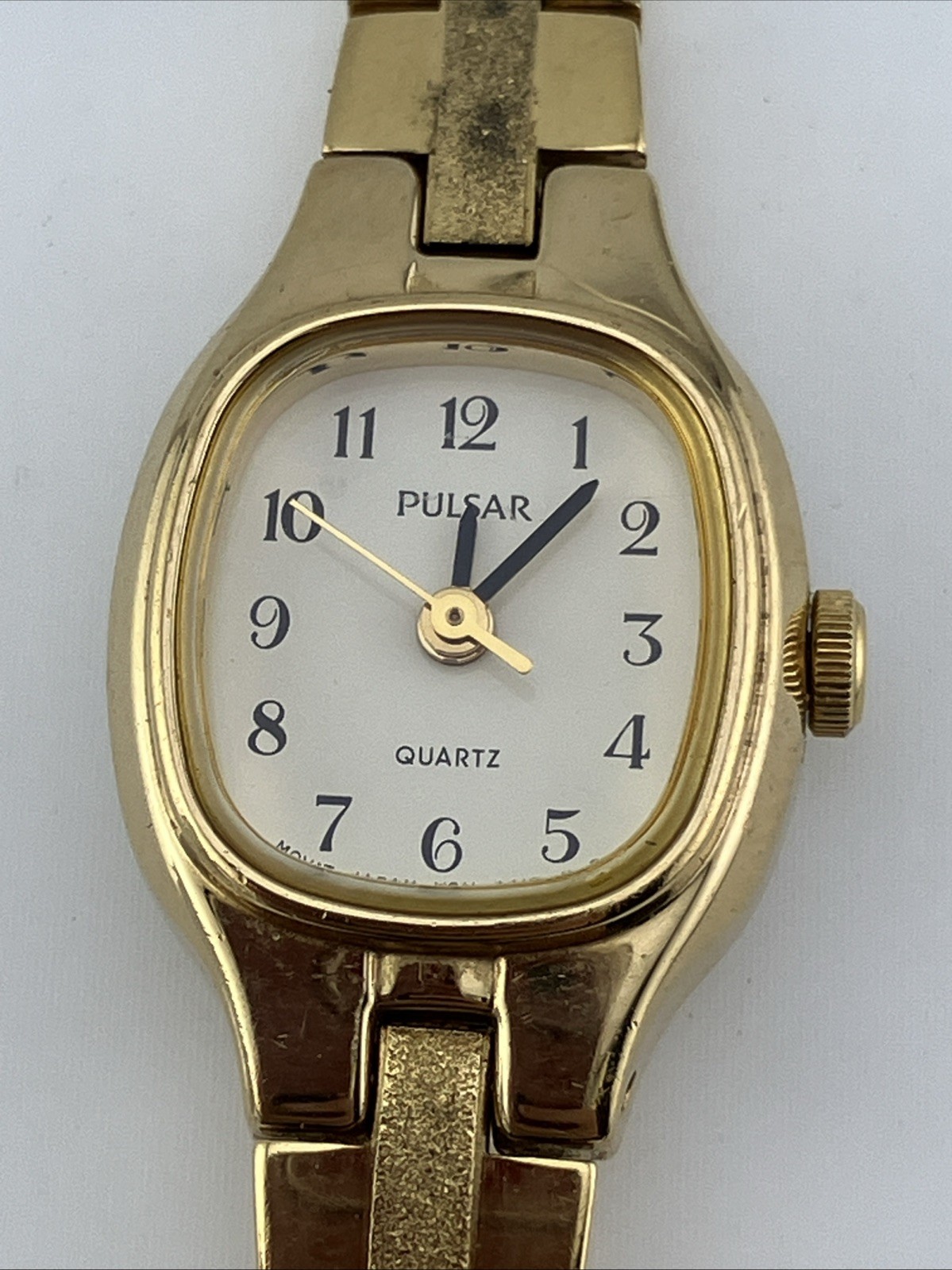 Vtg Pulsar Ladies 16mm Dainty Watch Gold Tone White Dial 6.25″ V811-5300 -RUNS