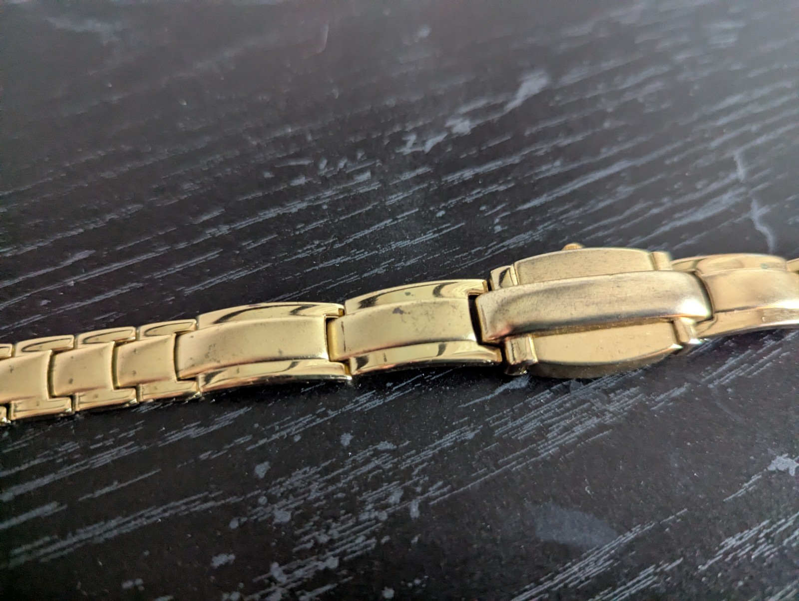 Gold plated watch by Royaltin with red crystal or Ruby not sure which. Very min